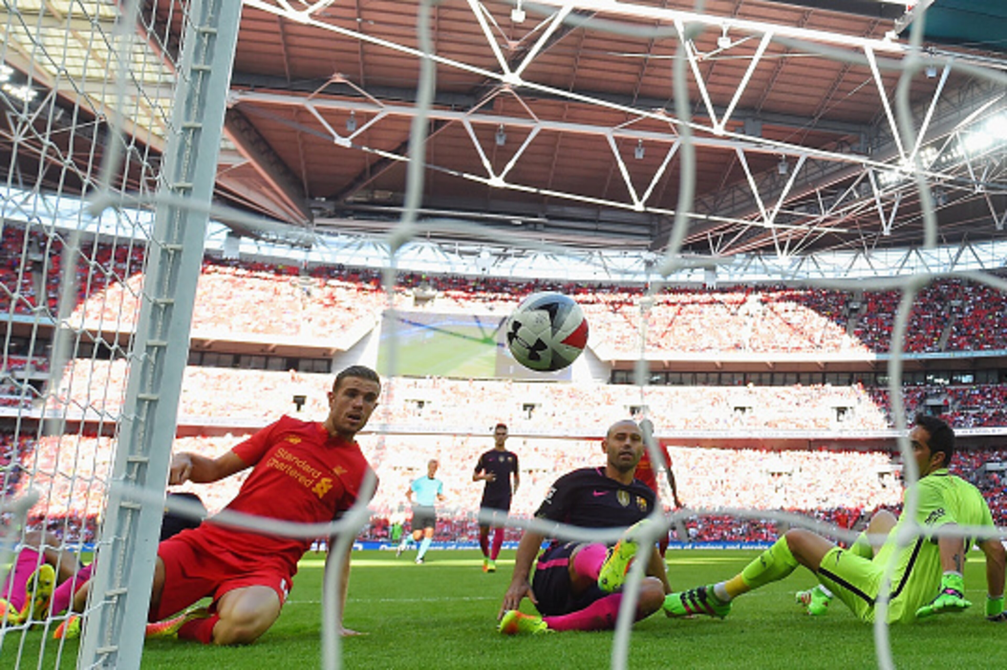 LONDON, ENGLAND - AUGUST 06:  Javier Mascherano of Barcelona scores an own goal for Liverpool's second goal during the International Champions Cup match between Liverpool and Barcelona at Wembley Stadium on August 6, 2016 in London, England.  (Photo by Mi