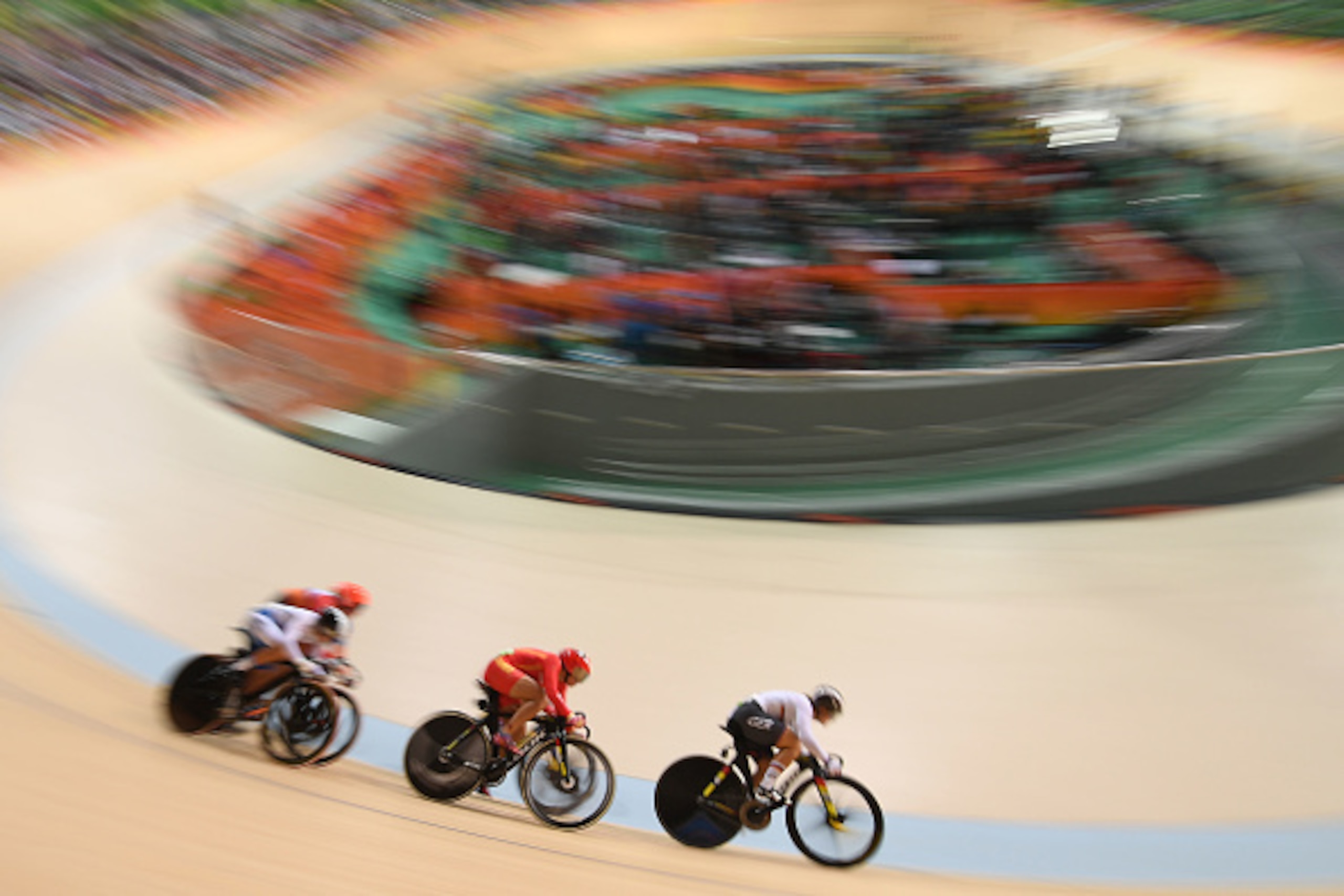 (From R) Germany's Kristina Vogel, China's Zhong Tianshi, the Netherlands' Elis Ligtlee and South Korea's Lee Hyejin compete in the women's Keirin second round track cycling event at the Velodrome during the Rio 2016 Olympic Games in Rio de Janeiro on Aug