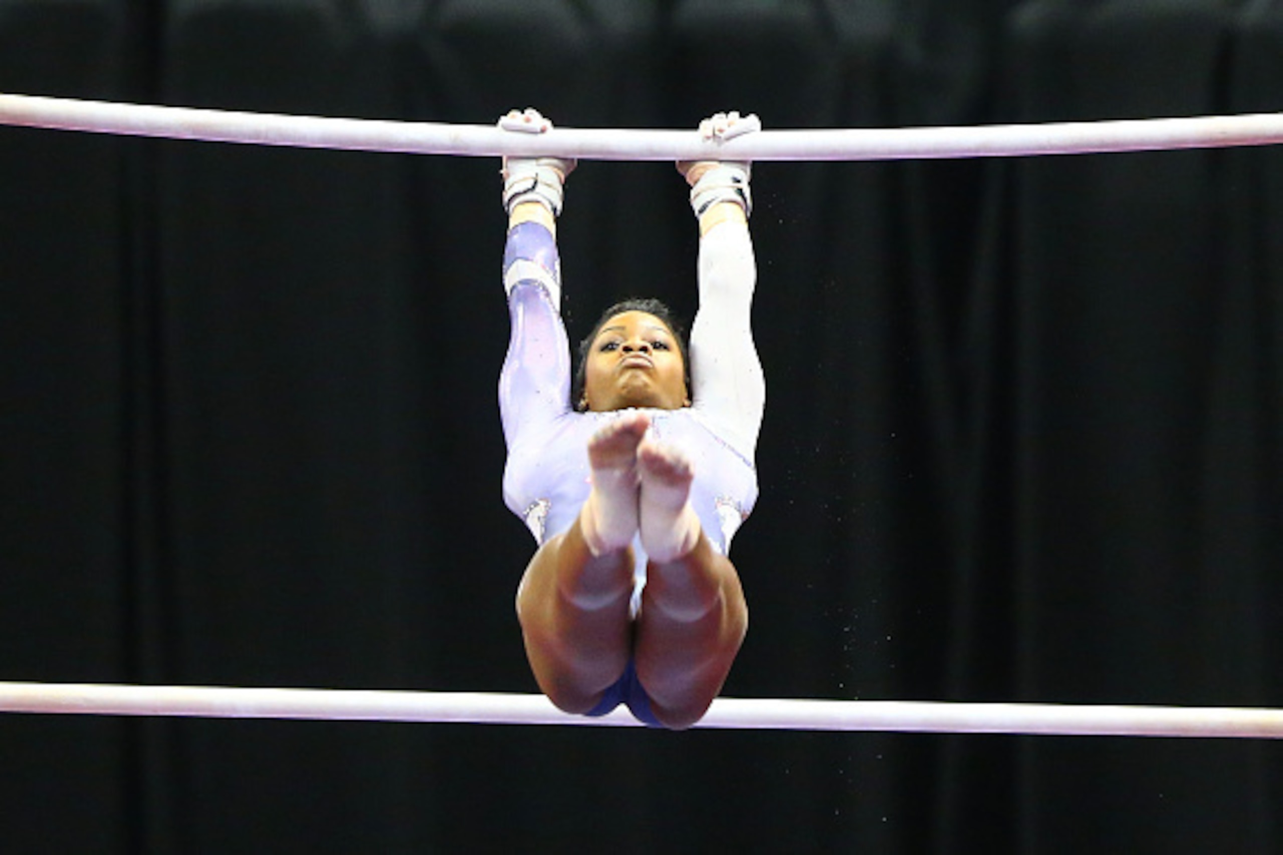 ST. LOUIS, MO - JUNE 26: Gabby Douglas competes on the uneven bars during day two of the 2016 P&G Gymnastics Championships at Chafitz Arena on June 26, 2016 in St. Louis, Missouri. (Photo by Dilip Vishwanat/Getty Images)