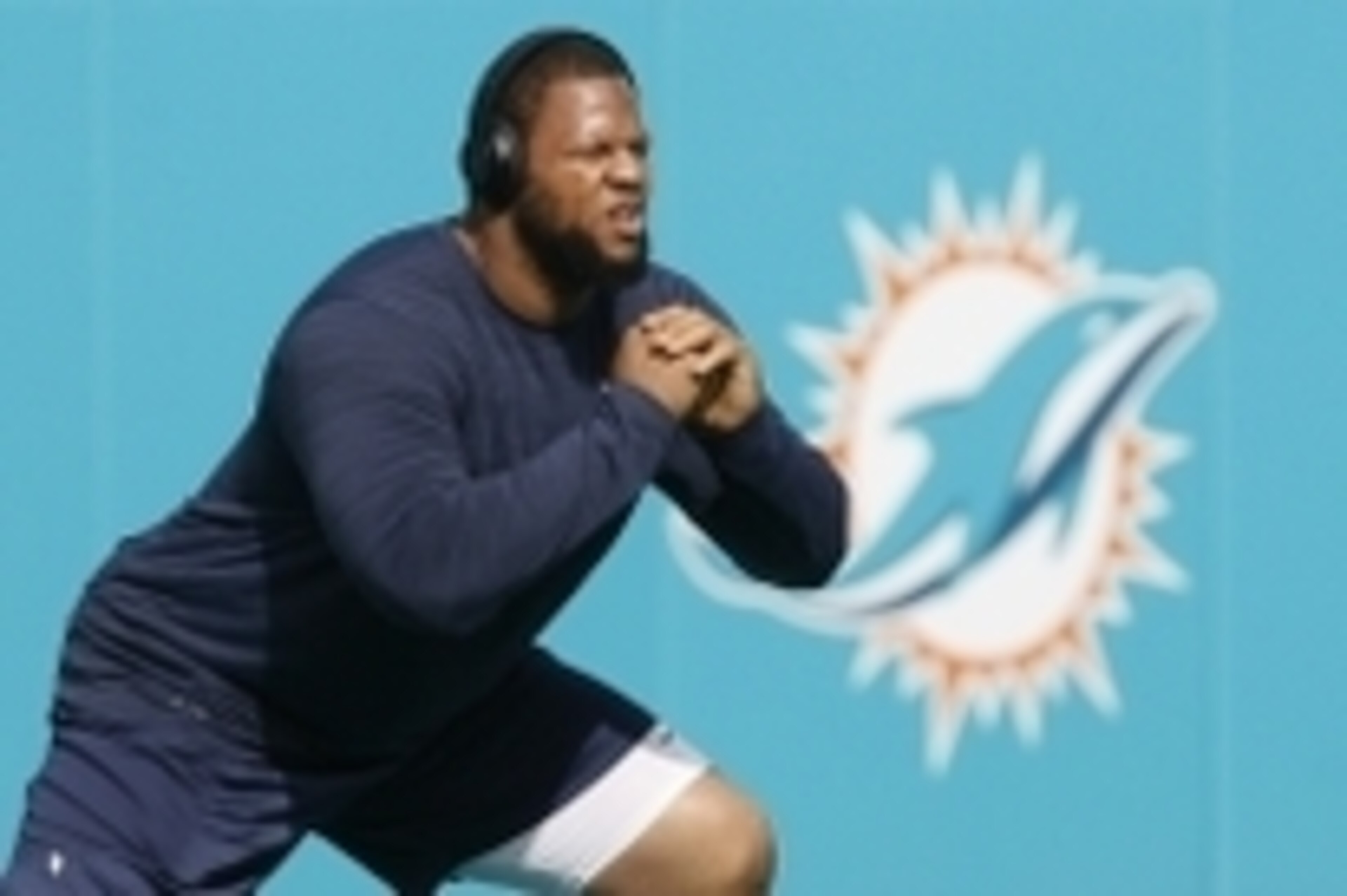 Dec 27, 2015; Miami Gardens, FL, USA;  Miami Dolphins defensive end Ndamukong Suh stretches before a game against the Indianapolis Colts at Sun Life Stadium. Mandatory Credit: Andrew Innerarity-USA TODAY Sports