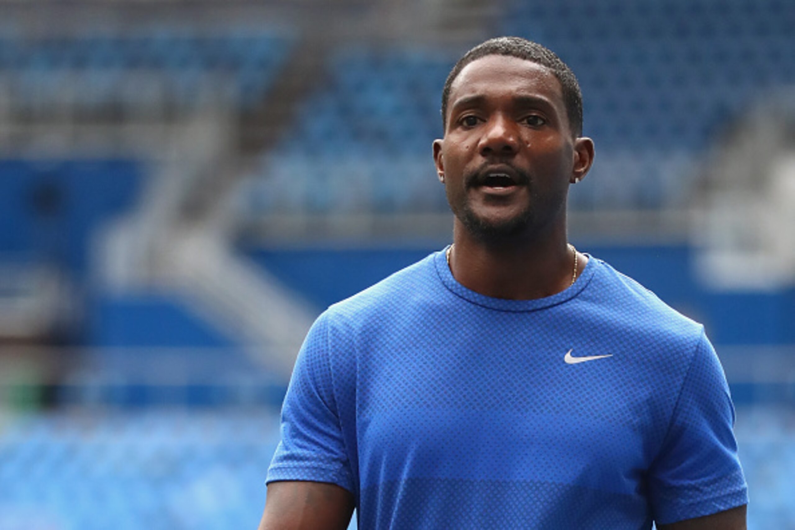 RIO DE JANEIRO, BRAZIL - AUGUST 10:  Justin Gatlin of USA looks on during a training session at Olympic Stadium on August 10, 2016 in Rio de Janeiro, Brazil.  (Photo by Alexander Hassenstein/Getty Images)