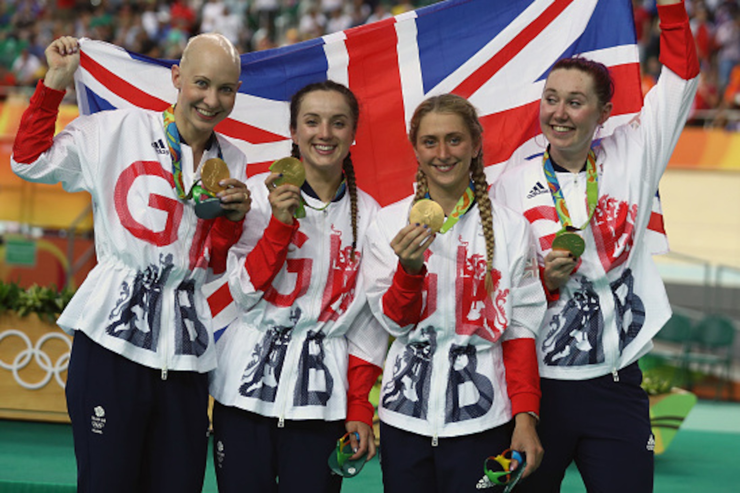 RIO DE JANEIRO, BRAZIL - AUGUST 13:  Gold medalists Laura Trott, Joanna Rowsell-Shand, Katie Archibald, Elinor Barker of Great Britain pose for photographs after the medal ceremony for the Women's Team Pursuit on Day 8 of the Rio 2016 Olympic Games at the