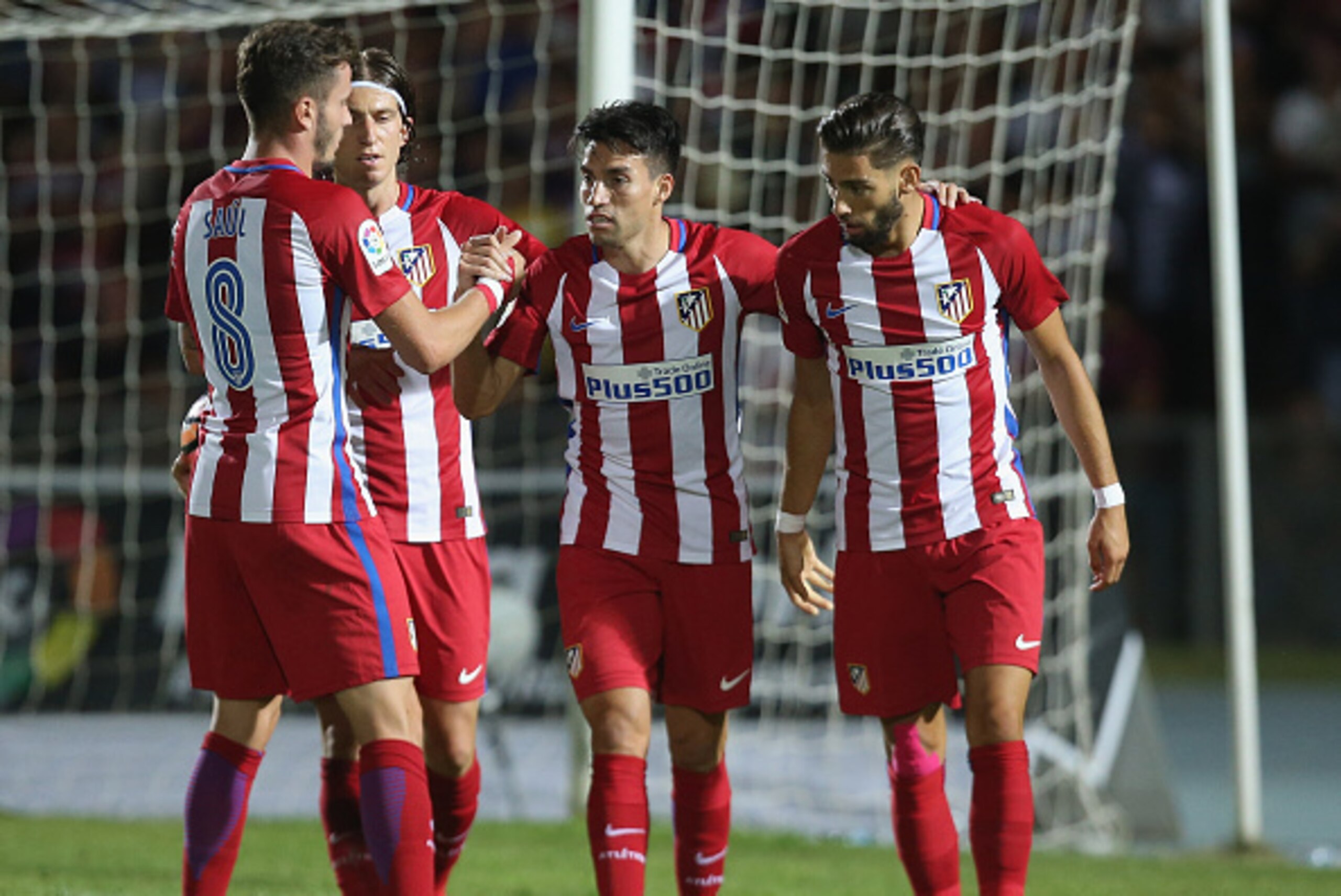 COSENZA, ITALY - AUGUST 06:  Nico Gaitan (C) of Atletico de Madrid celebrates after scoring the opening goal during a pre-season friendly match between FC Crotone and Club Atletico de Madrid at Stadio Comunale Gigi Marulla on August 6, 2016 in Cosenza, It