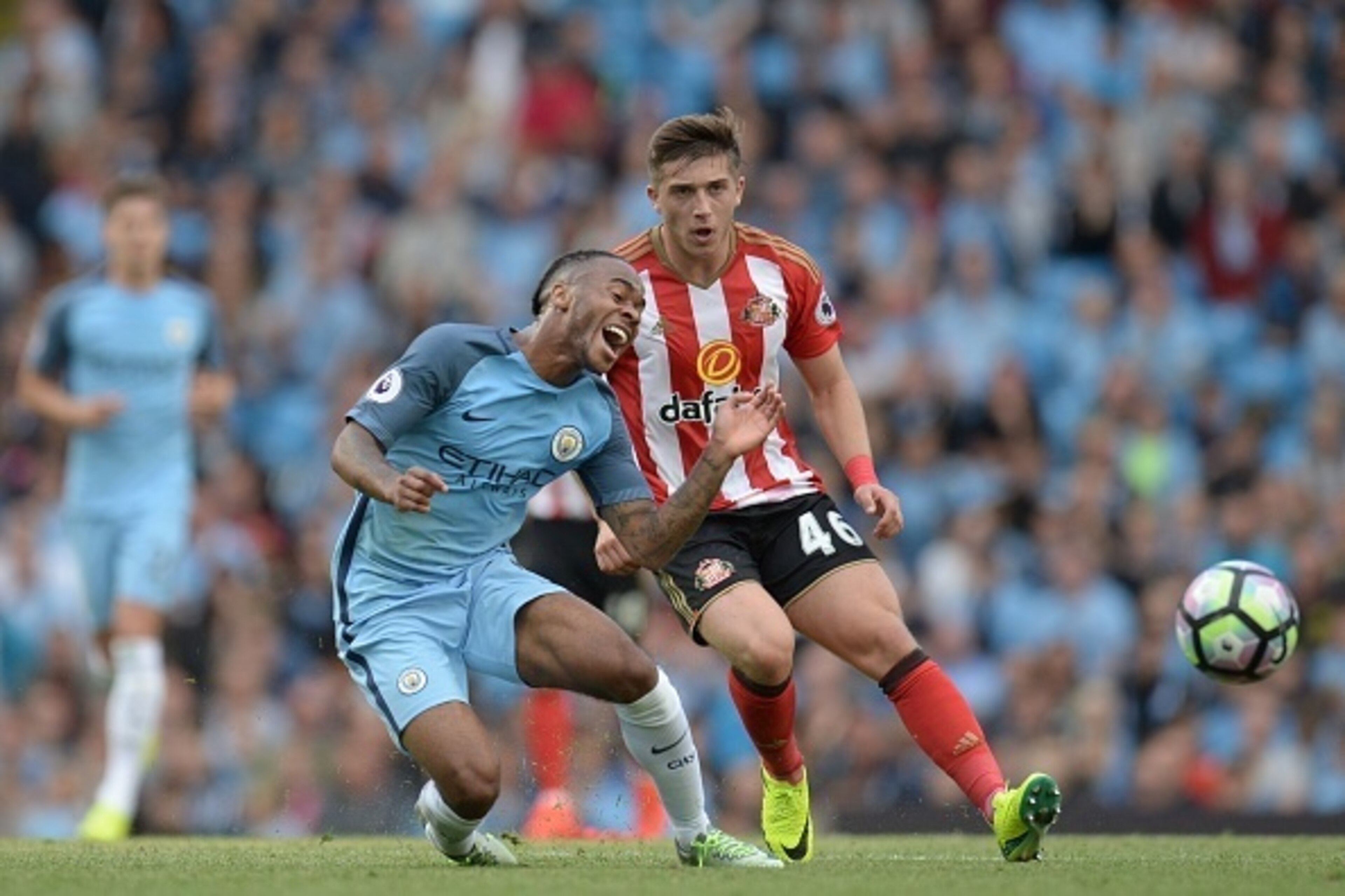 Sunderland's US midfielder Lynden Gooch (R) challenges Manchester City's English midfielder Raheem Sterling (L) during the English Premier League football match between Manchester City and Sunderland at the Etihad Stadium in Manchester, north west England