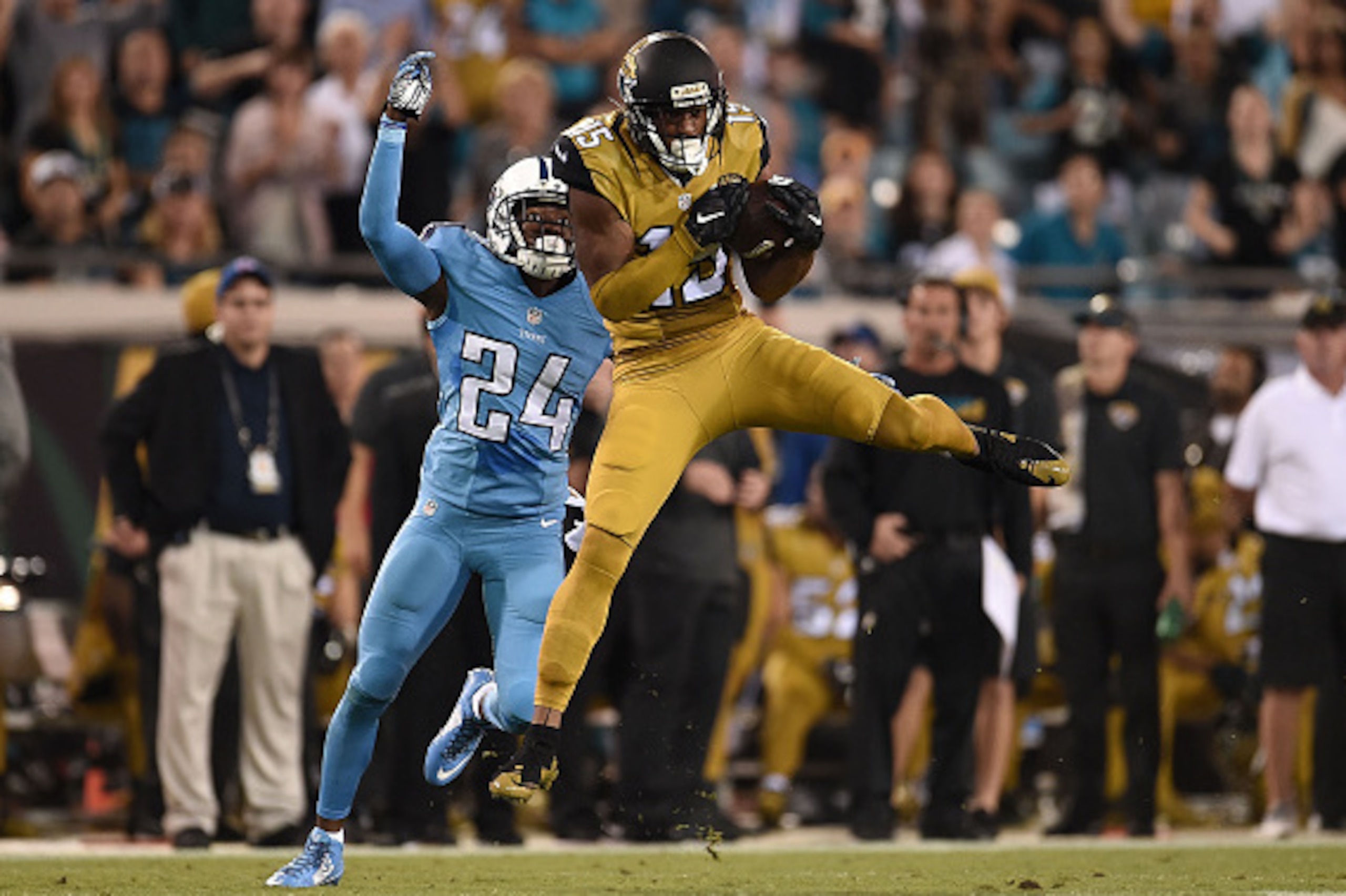 JACKSONVILLE, FL - NOVEMBER 19:  Allen Robinson #15 of the Jacksonville Jaguars catches a pass in front of Coty Sensabaugh #24 of the Tennessee Titans during a game at EverBank Field on November 19, 2015 in Jacksonville, Florida.  Jacksonville defeated Te