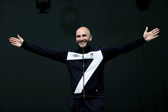RIO DE JANEIRO, BRAZIL - AUGUST 08: Niccolo Campriani of Italy smiles on the podium prior to receiving his gold medal for winning the 10m Air Rifle event on Day 3 of the Rio 2016 Olympic Games at the Olympic Shooting Centre on August 8, 2016 in Rio de Ja RIO DE JANEIRO, BRAZIL - AUGUST 08: Niccolo Campriani of Italy smiles on the podium prior to receiving his gold medal for winning the 10m Air Rifle event on Day 3 of the Rio 2016 Olympic Games at the Olympic Shooting Centre on August 8, 2016 in Rio de Ja