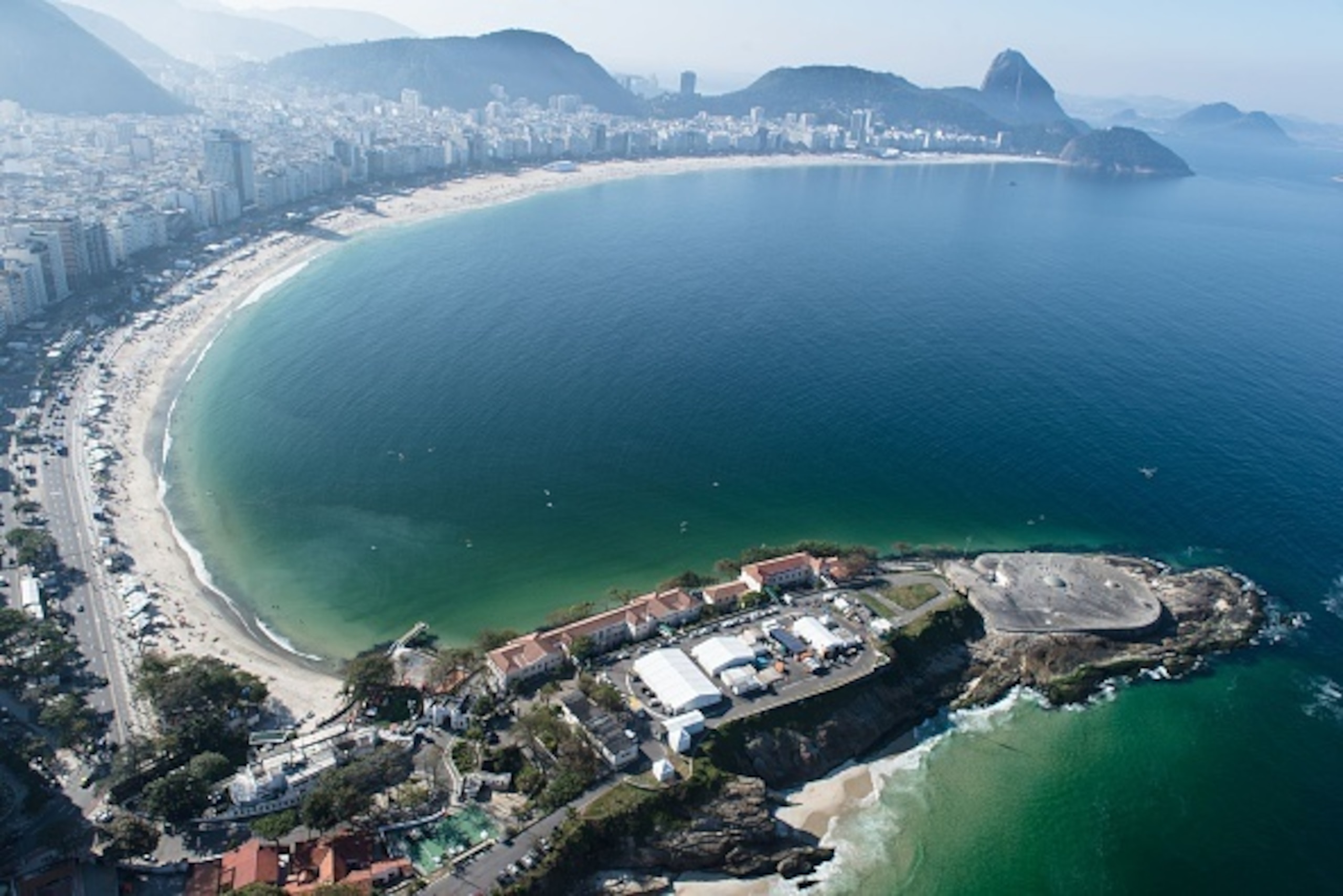 Aerial view of the Fort Copacabana venue where will be hosted the marathon swimming, triathlon events and will be the starting point for the road cycling discipline during the Rio 2016 Olympic Games, on July 26, 2016 in Rio de Janeiro, Brazil. / AFP / YAS
