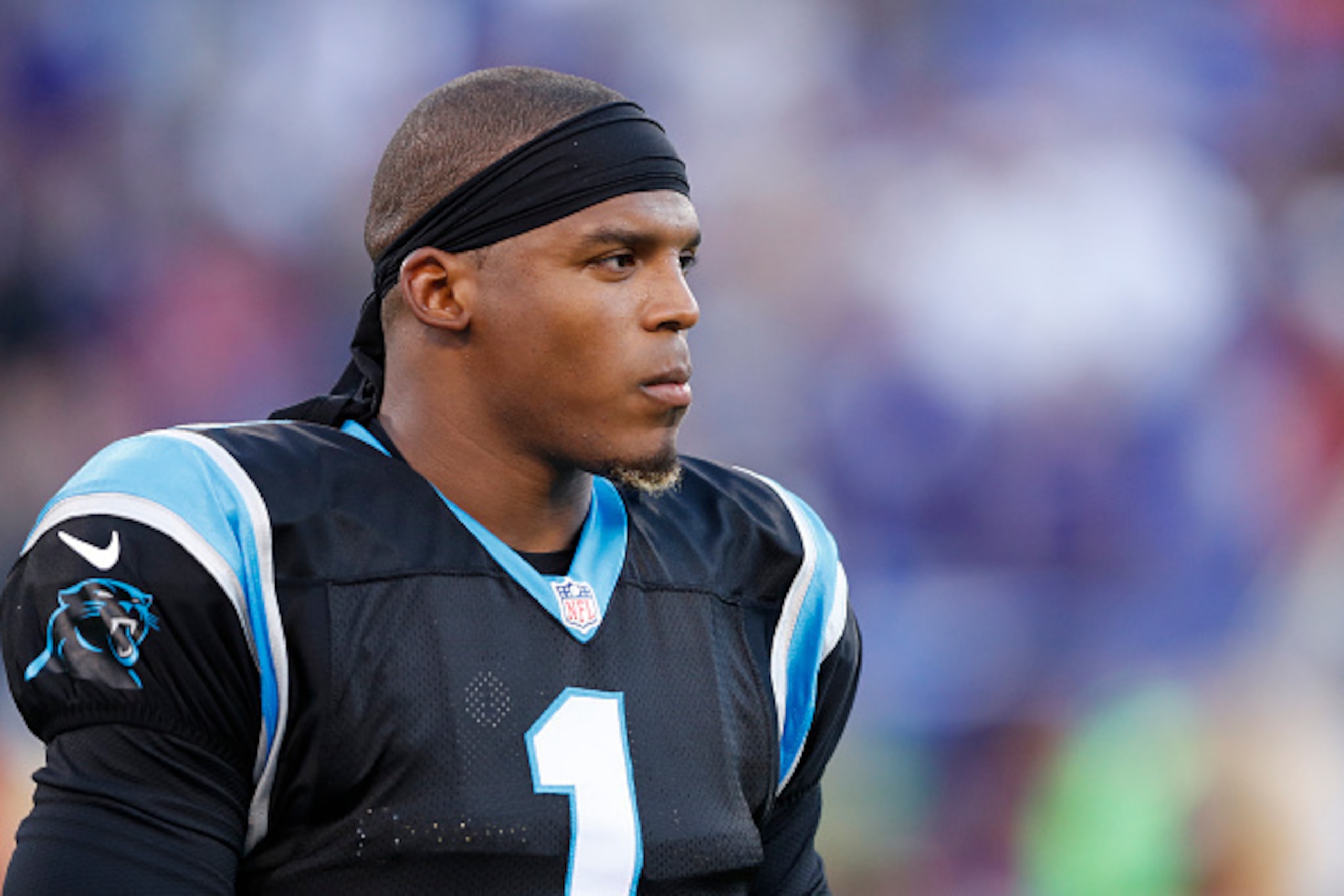 BALTIMORE, MD - AUGUST 11: Cam Newton #1 of the Carolina Panthers looks on during a preseason NFL game against the Baltimore Ravens at M&T Bank Stadium on August 11, 2016 in Baltimore, Maryland. The Ravens defeated the Panthers 22-19. (Photo by Joe Robbin