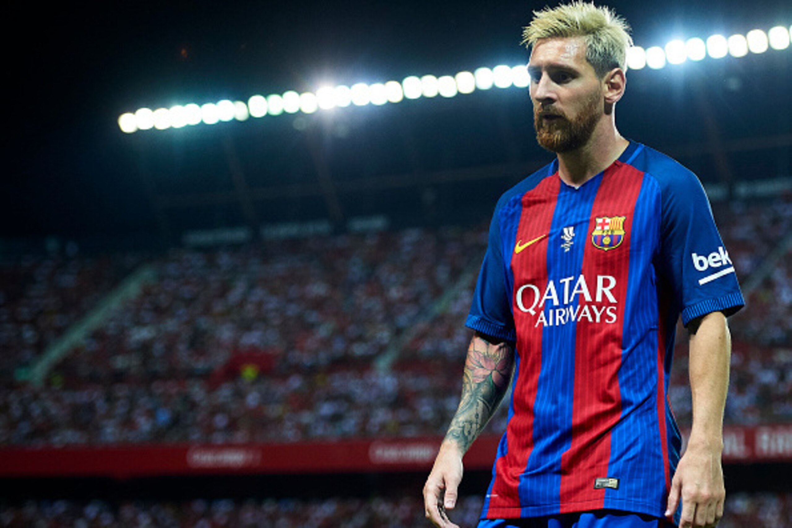 SEVILLE, SPAIN - AUGUST 14:  Lionel Messi of FC Barcelona looks on during the match between Sevilla FC vs FC Barcelona as part of the Spanish Super Cup Final 1st Leg  at Estadio Ramon Sanchez Pizjuan on August 14, 2016 in Seville, Spain.  (Photo by Aitor 