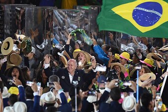 Brazil's national delegation take part in the opening ceremony of the Rio 2016 Olympic Games at the Maracana stadium in Rio de Janeiro on August 5, 2016. / AFP / FRANCK FIFE        (Photo credit should read FRANCK FIFE/AFP/Getty Images)