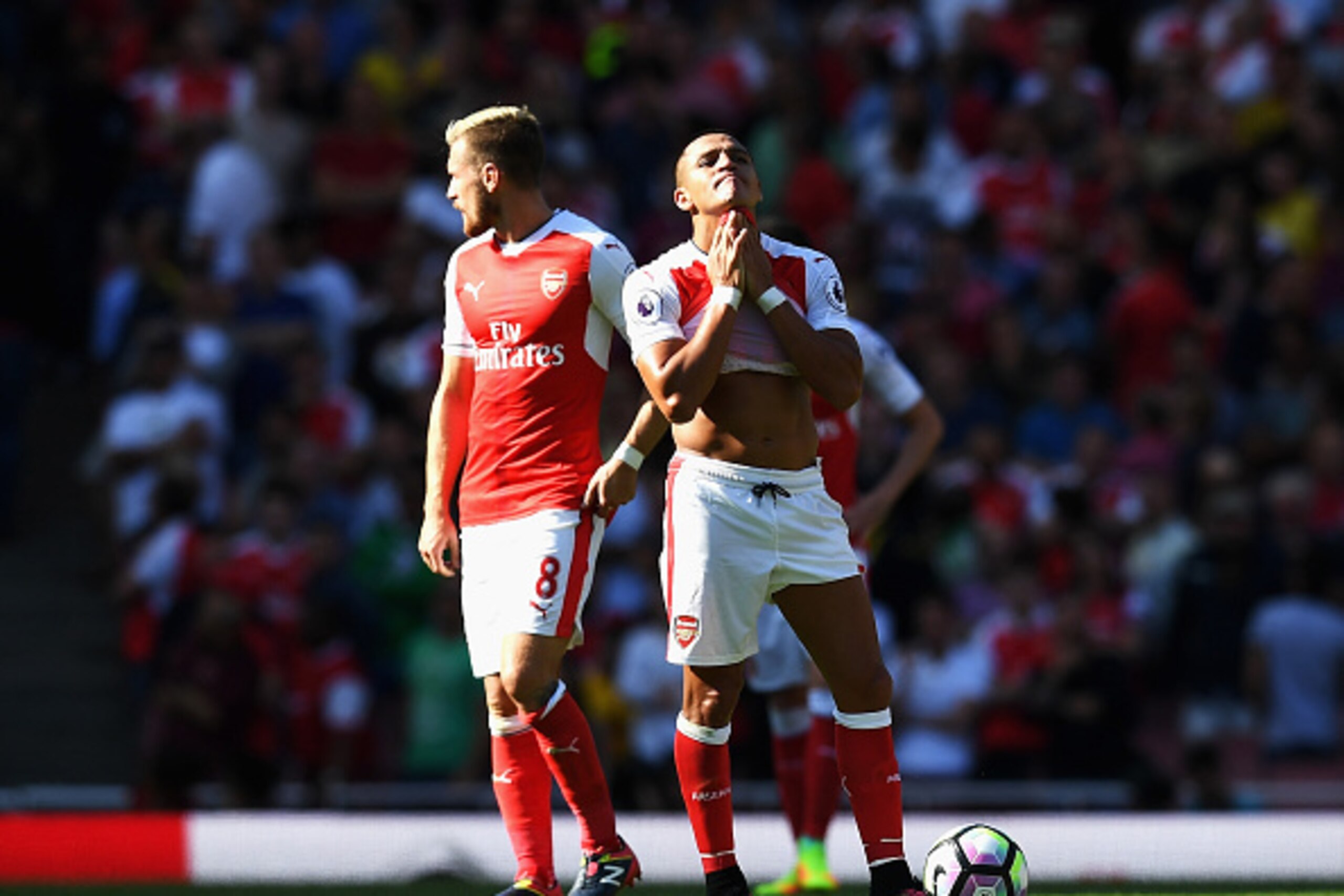 LONDON, ENGLAND - AUGUST 14: Alexis Sanchez of Arsenal reacts after the Liverpool goal scored by Philippe Coutinho during the Premier League match between Arsenal and Liverpool at Emirates Stadium on August 14, 2016 in London, England. (Photo by Michael LONDON, ENGLAND - AUGUST 14: Alexis Sanchez of Arsenal reacts after the Liverpool goal scored by Philippe Coutinho during the Premier League match between Arsenal and Liverpool at Emirates Stadium on August 14, 2016 in London, England. (Photo by Michael
