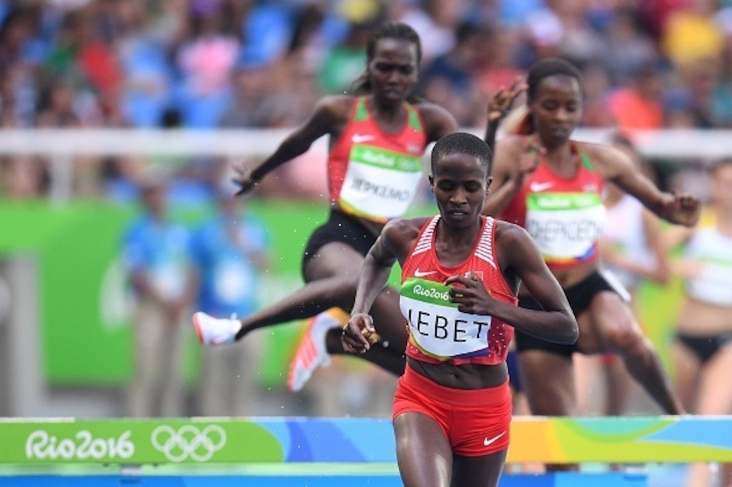 Barhain's Ruth Jebet competes in the Women's 3000m Steeplechase Final during the athletics event at the Rio 2016 Olympic Games at the Olympic Stadium in Rio de Janeiro on August 15, 2016.   / AFP / Johannes EISELE        (Photo credit should read JOHANNES
