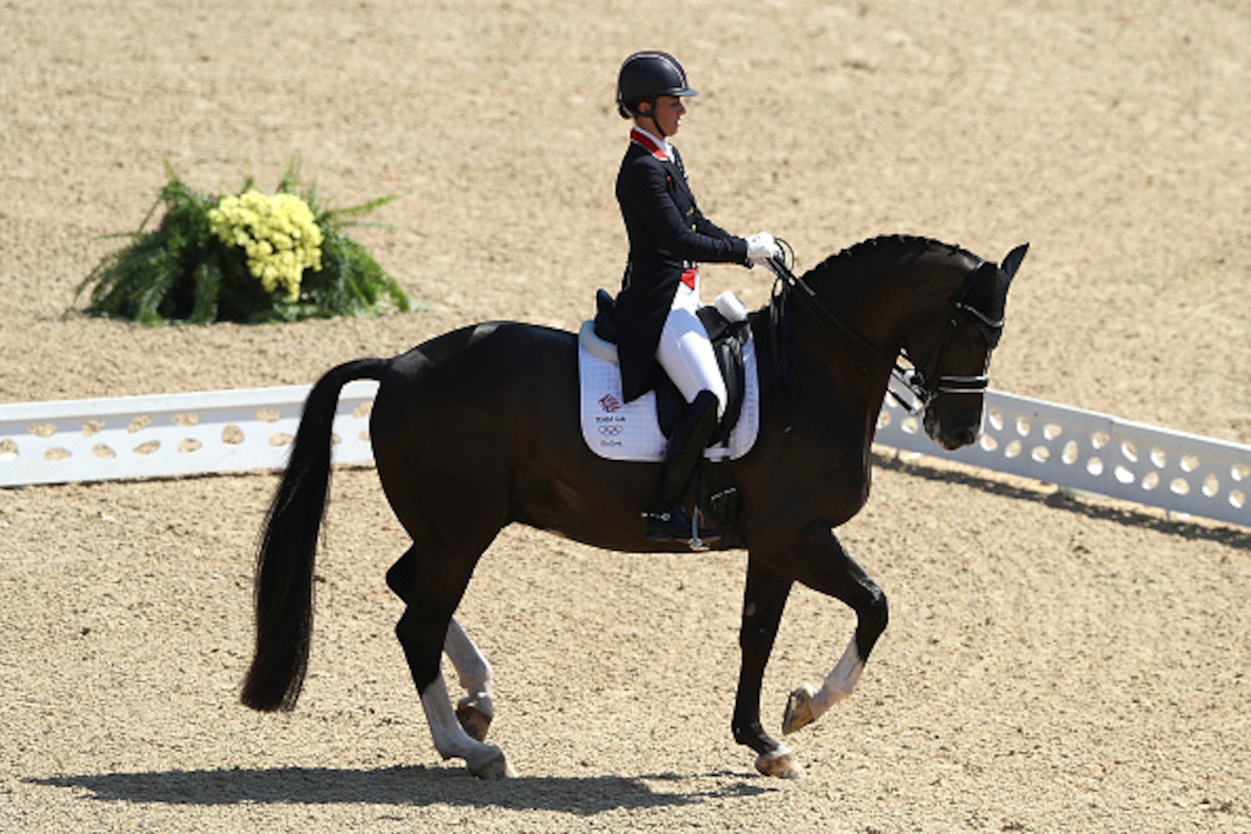 RIO DE JANEIRO, BRAZIL - AUGUST 15:  Charlotte Dujardin of Great Britain riding Valegro competes in the Dressage Individual Grand Prix Freestyle on Day 10 of the Rio 2016 Olympic Games at Olympic Equestrian Centre on August 15, 2016 in Rio de Janeiro, Bra