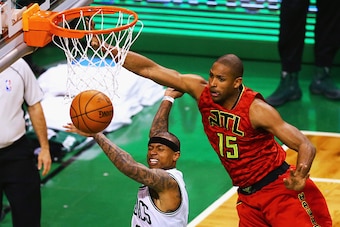 BOSTON, MA - APRIL 24:  Al Horford #15 of the Atlanta Hawks defends a shot by Isaiah Thomas #4 of the Boston Celtics during the fourth quarter of Game Four of the Eastern Conference Quarterfinals during the 2016 NBA Playoffs at TD Garden on April 24, 2016