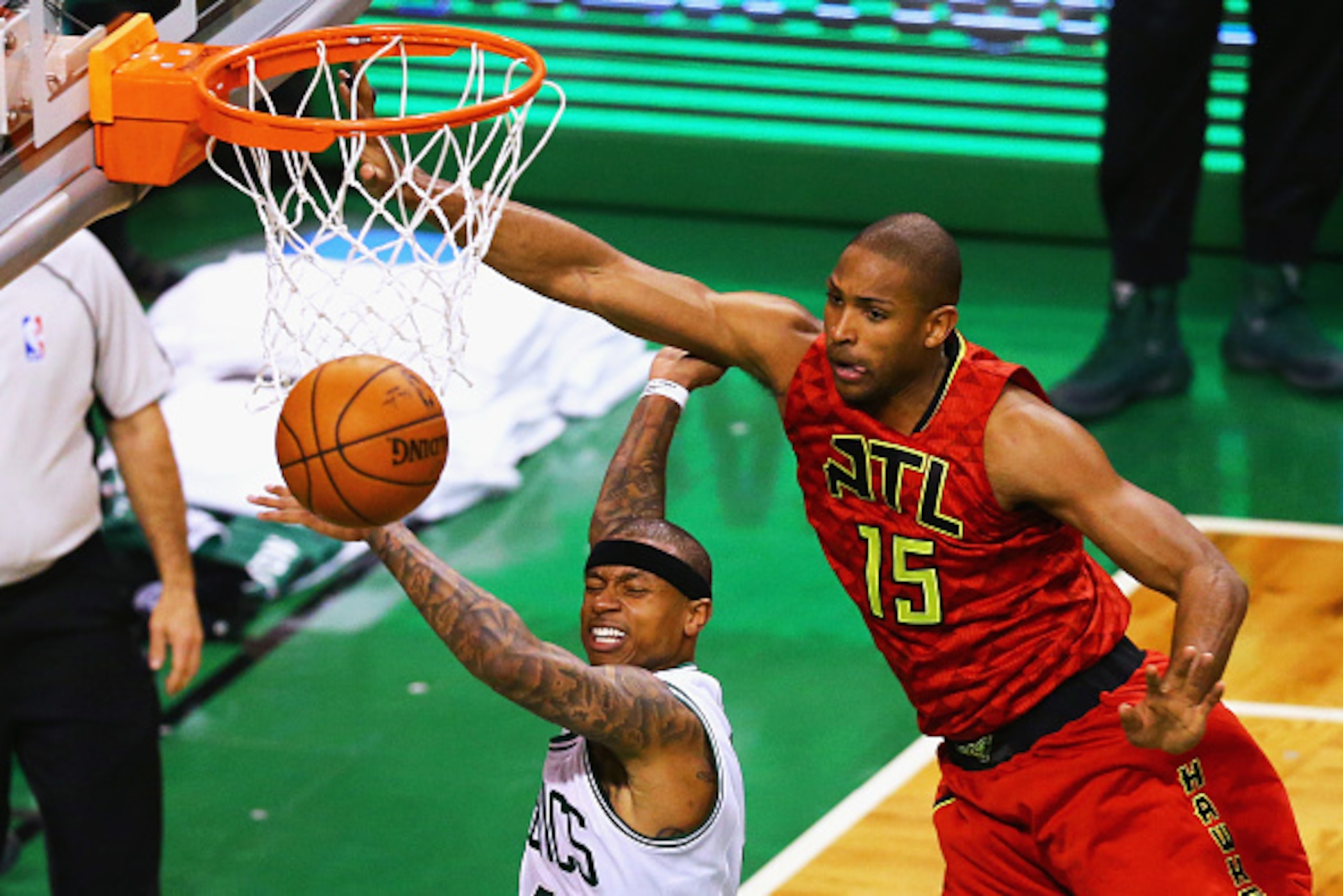 BOSTON, MA - APRIL 24:  Al Horford #15 of the Atlanta Hawks defends a shot by Isaiah Thomas #4 of the Boston Celtics during the fourth quarter of Game Four of the Eastern Conference Quarterfinals during the 2016 NBA Playoffs at TD Garden on April 24, 2016