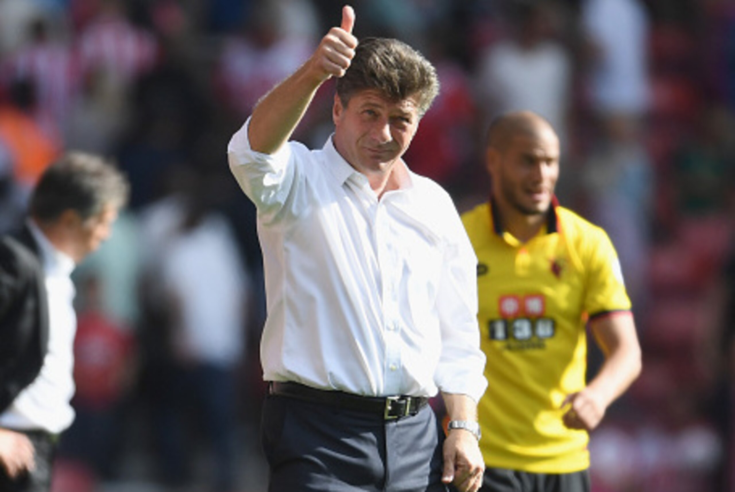 SOUTHAMPTON, ENGLAND - AUGUST 13: Walter Mazzarri, Manager of Watford gives a thumbs up to the Watford fans during the Premier League match between Southampton and Watford at St Mary's Stadium on August 13, 2016 in Southampton, England.  (Photo by Mike He