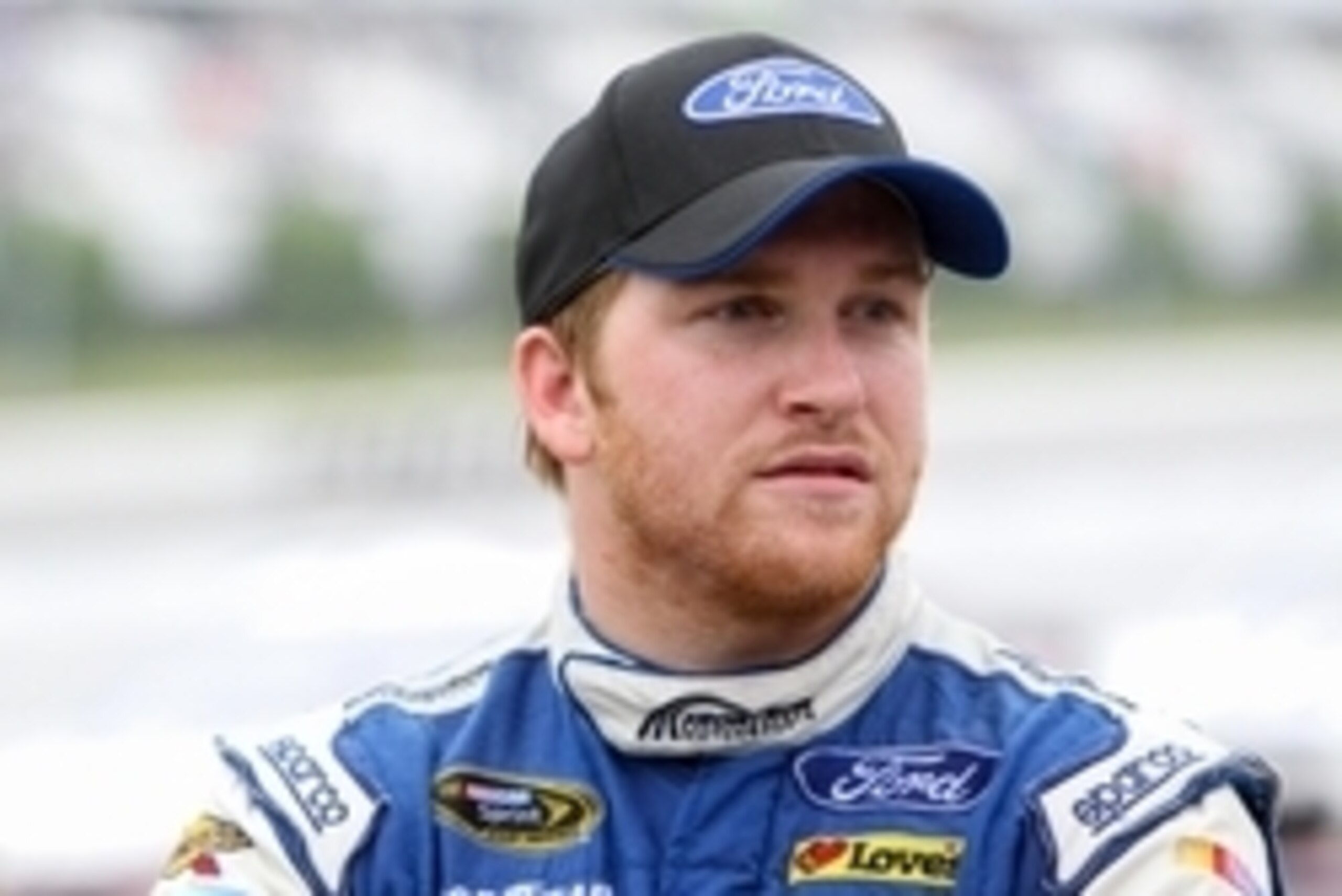 Aug 1, 2016; Long Pond, PA, USA; NASCAR Sprint Cup Series driver Chris Buescher stands on pit road during a red flag during the Pennsylvania 400 at Pocono Raceway. Mandatory Credit: Matthew O'Haren-USA TODAY Sports Aug 1, 2016; Long Pond, PA, USA; NASCAR Sprint Cup Series driver Chris Buescher stands on pit road during a red flag during the Pennsylvania 400 at Pocono Raceway. Mandatory Credit: Matthew O'Haren-USA TODAY Sports