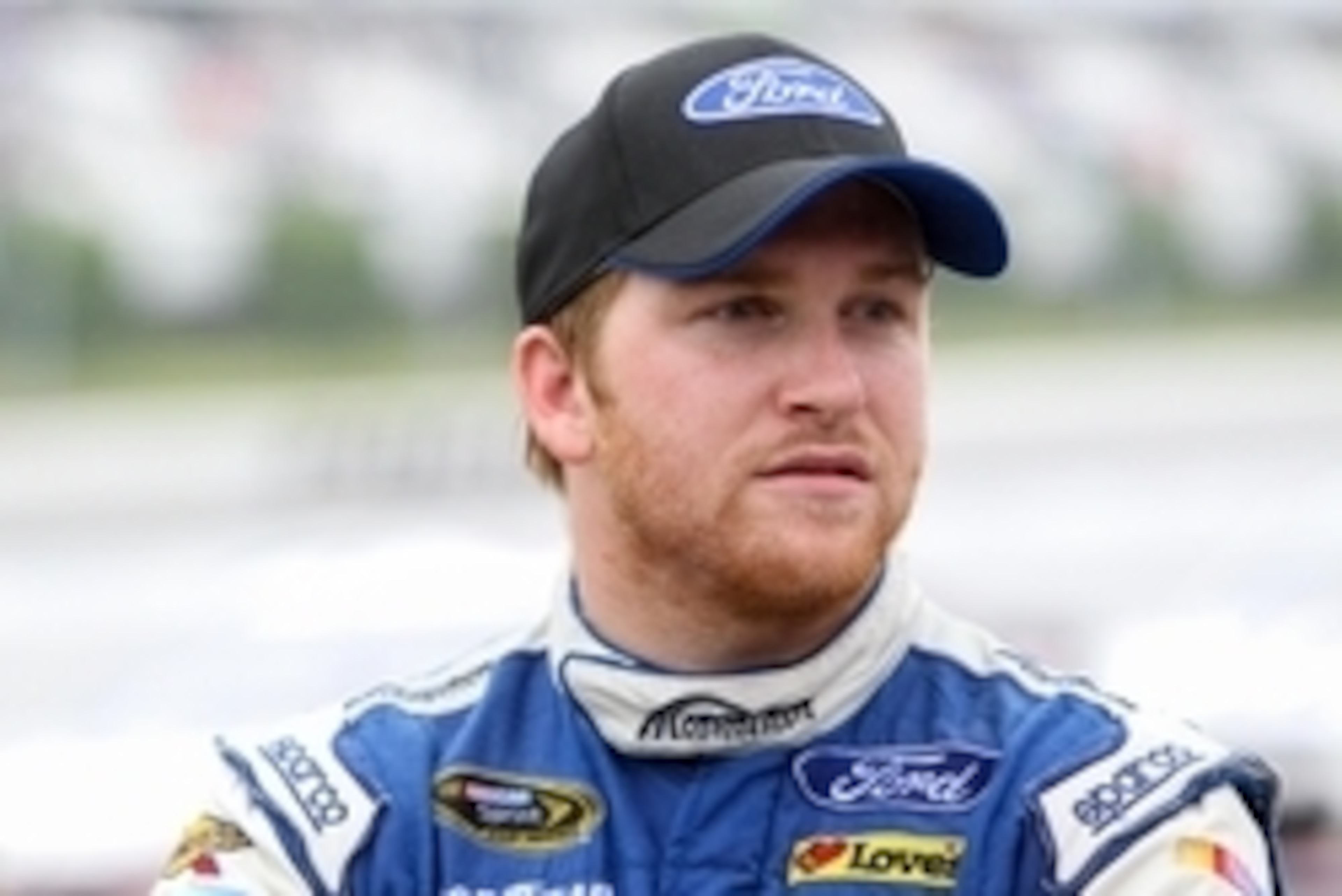 Aug 1, 2016; Long Pond, PA, USA; NASCAR Sprint Cup Series driver Chris Buescher stands on pit road during a red flag during the Pennsylvania 400 at Pocono Raceway. Mandatory Credit: Matthew O'Haren-USA TODAY Sports