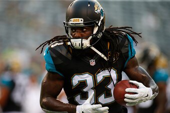EAST RUTHERFORD, NJ - AUGUST 11: Chris Ivory #33 of the Jacksonville Jaguars runs a play before an NFL preseason game against the New York Jets at MetLife Stadium on August 11, 2016 in East Rutherford, New Jersey. (Photo by Rich Schultz/Getty Images)
