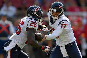 SANTA CLARA, CA - AUGUST 14:  Quarterback Brock Osweiler #17 of the Houston Texans hand the ball off to running back Lamar Miller #26 against the San Francisco 49ers in the first quarter of a preseason game at Levi's Stadium on August 14, 2016 in Santa Cl