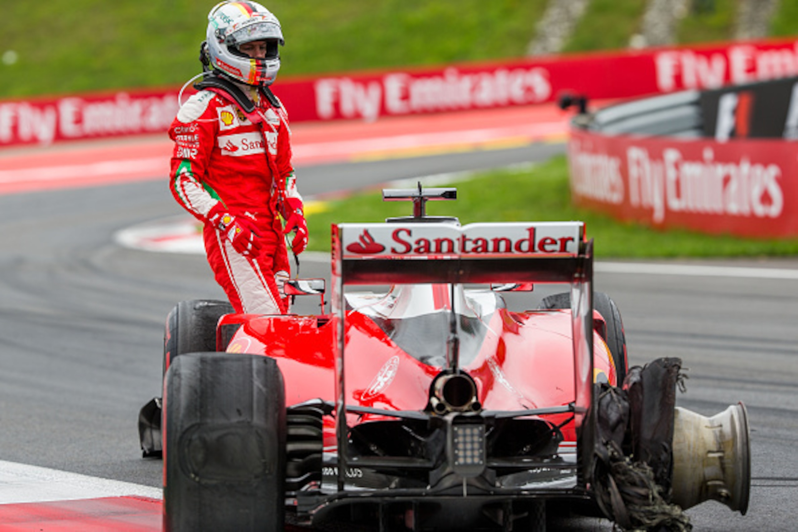 SPIELBERG, AUSTRIA - JULY 03:  Sebastian Vettel of Ferrari and Germany crashes due to tyre failure during the Formula One Grand Prix of Austria at Red Bull Ring on July 3, 2016 in Spielberg, Austria.  (Photo by Peter J Fox/Getty Images)