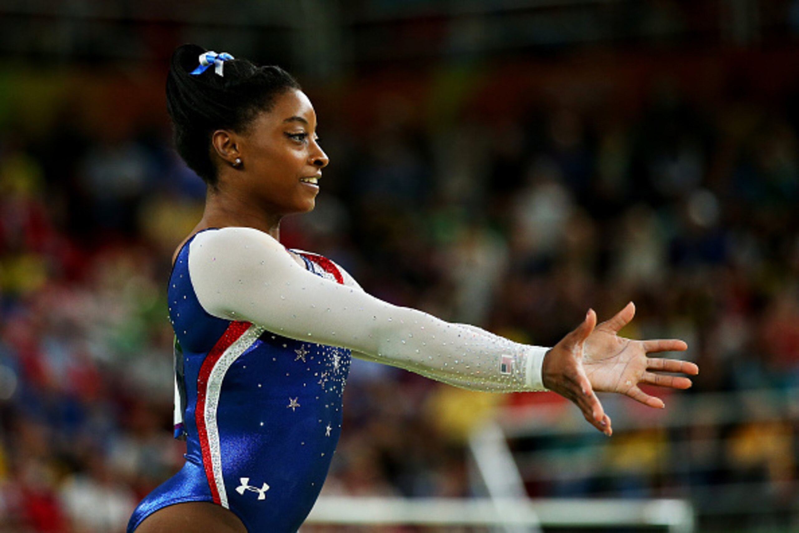 RIO DE JANEIRO, BRAZIL - AUGUST 11:  Simone Biles of the United States competes on the floor during the Women's Individual All Around Final on Day 6 of the 2016 Rio Olympics at Rio Olympic Arena on August 11, 2016 in Rio de Janeiro, Brazil.  (Photo by Ale