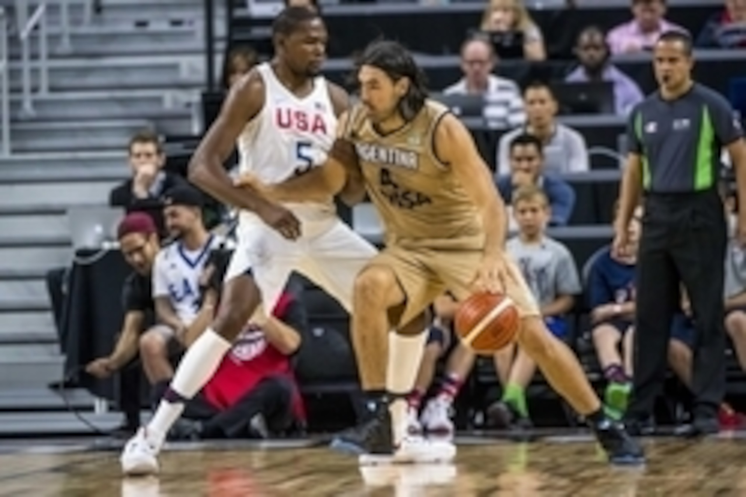 Jul 22, 2016; Las Vegas, NV, USA; Argentina forward Luis Scola (4) is defended by USA guard Kevin Durant (5) during a basketball exhibition game at T-Mobile Arena. USA won 111-74. Mandatory Credit: Joshua Dahl-USA TODAY Sports