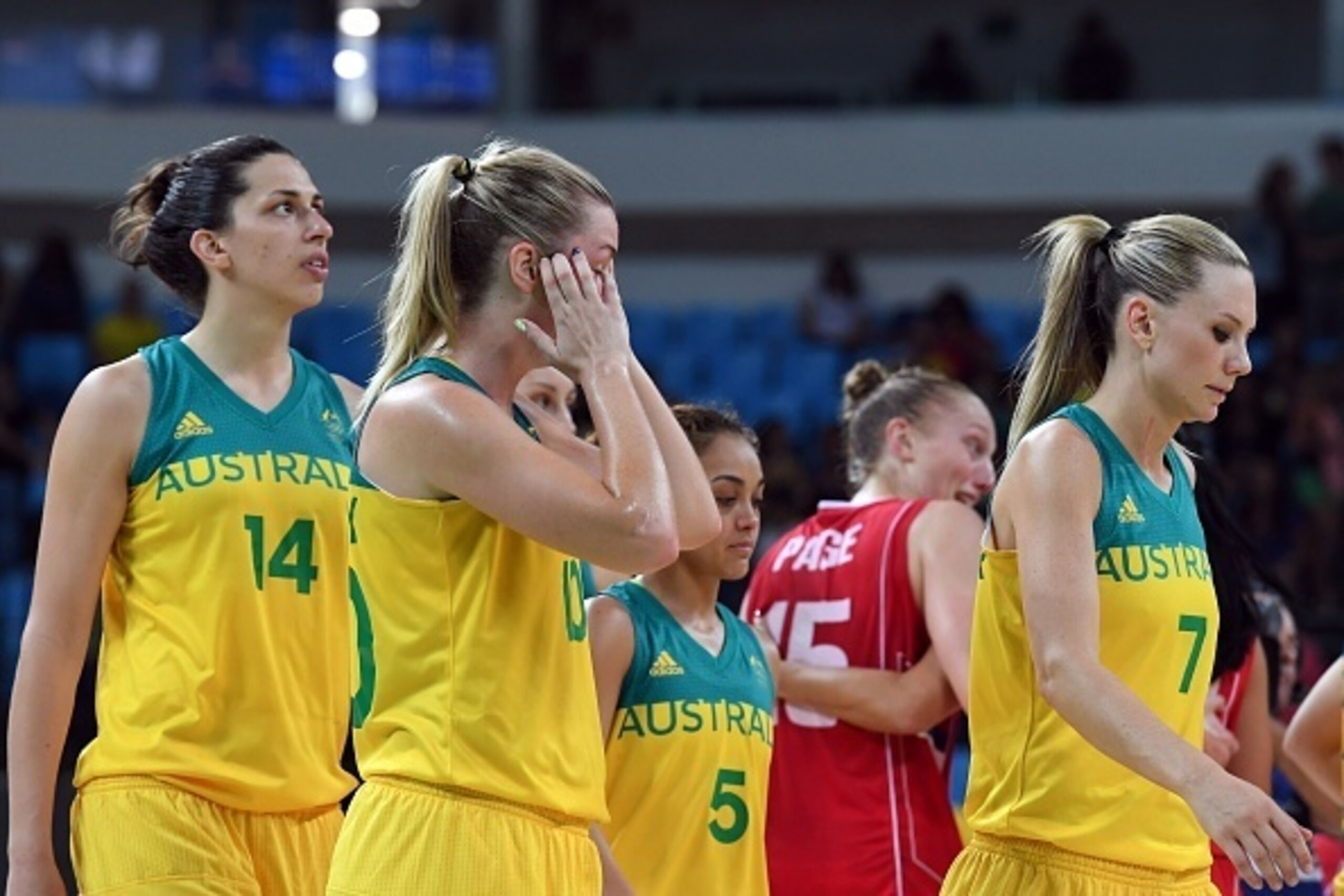 (From L) Australia's centre Marianna Tolo, Australia's small forward Rachel Jarry, Serbia's forward Sonja Petrovic and Australia's forward Penny Taylor react after losing to Serbia during a Women's quarterfinal basketball match between Australia and Serbi (From L) Australia's centre Marianna Tolo, Australia's small forward Rachel Jarry, Serbia's forward Sonja Petrovic and Australia's forward Penny Taylor react after losing to Serbia during a Women's quarterfinal basketball match between Australia and Serbi