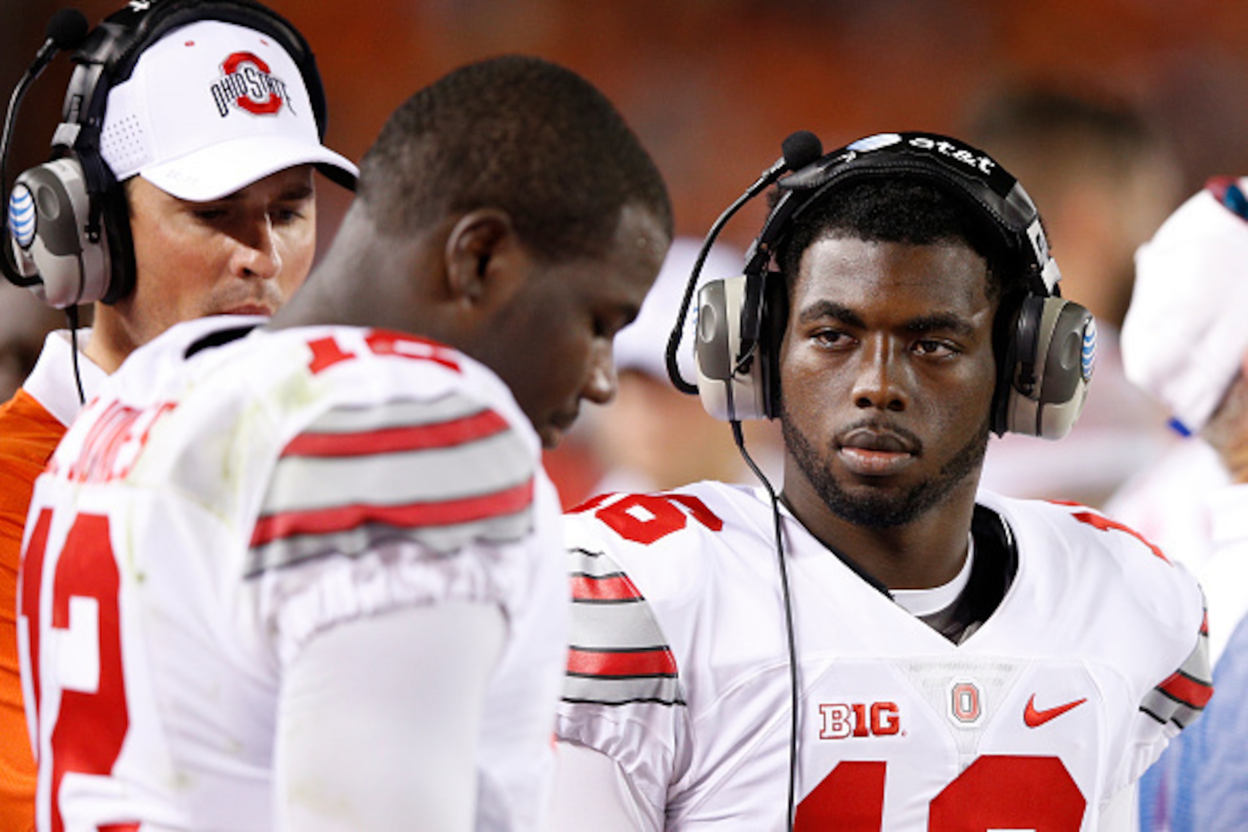 BLACKSBURG, VA - SEPTEMBER 7: J.T. Barrett #16 of the Ohio State Buckeyes talks to Cardale Jones #12 after he threw an interception in the second quarter against the Virginia Tech Hokies at Lane Stadium on September 7, 2015 in Blacksburg, Virginia. (Photo