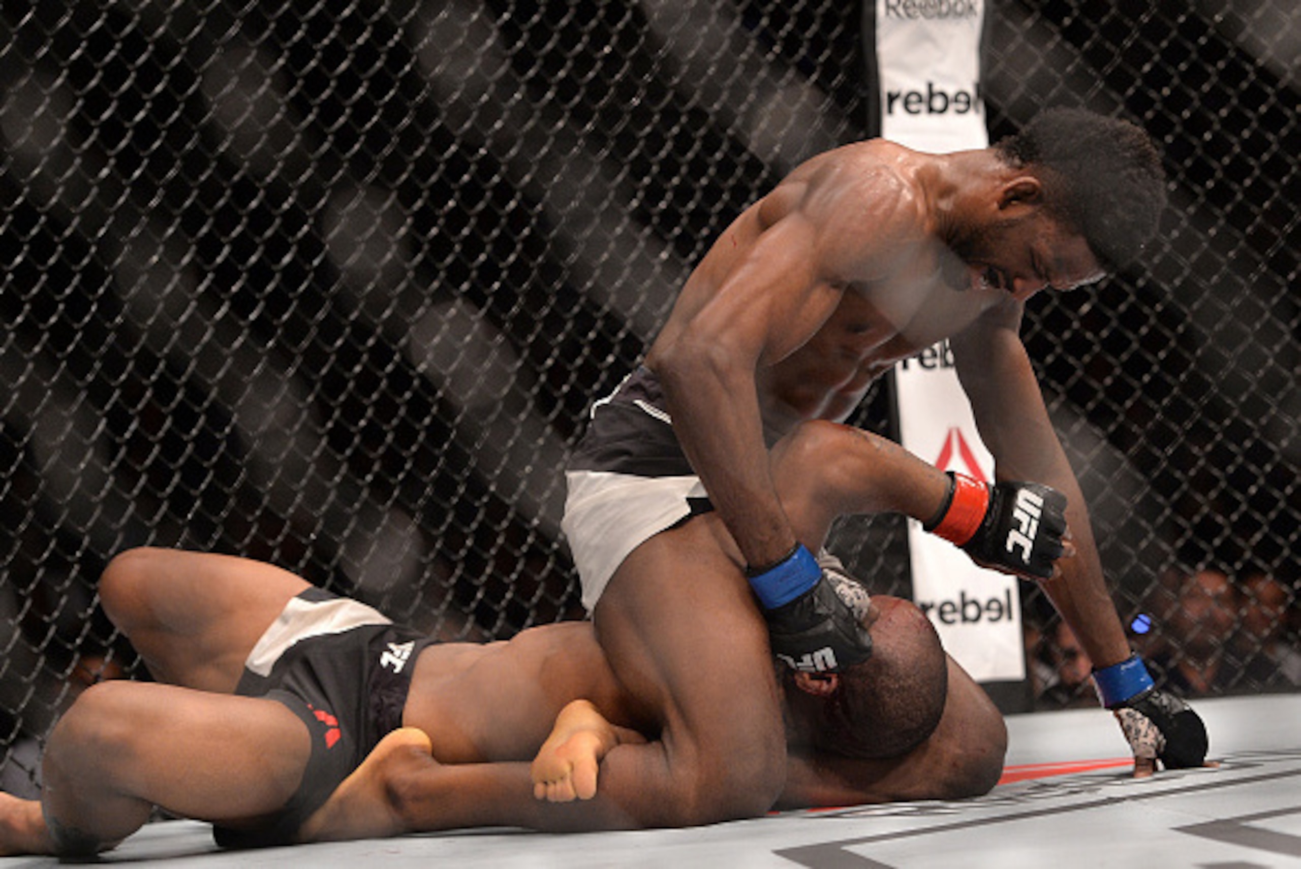 BRISBANE, AUSTRALIA - MARCH 20:  Neil Magny dominates against Hector Lombard during their UFC Welterweight Bout at UFC Brisbane on March 20, 2016 in Brisbane, Australia.  (Photo by Bradley Kanaris/Getty Images)