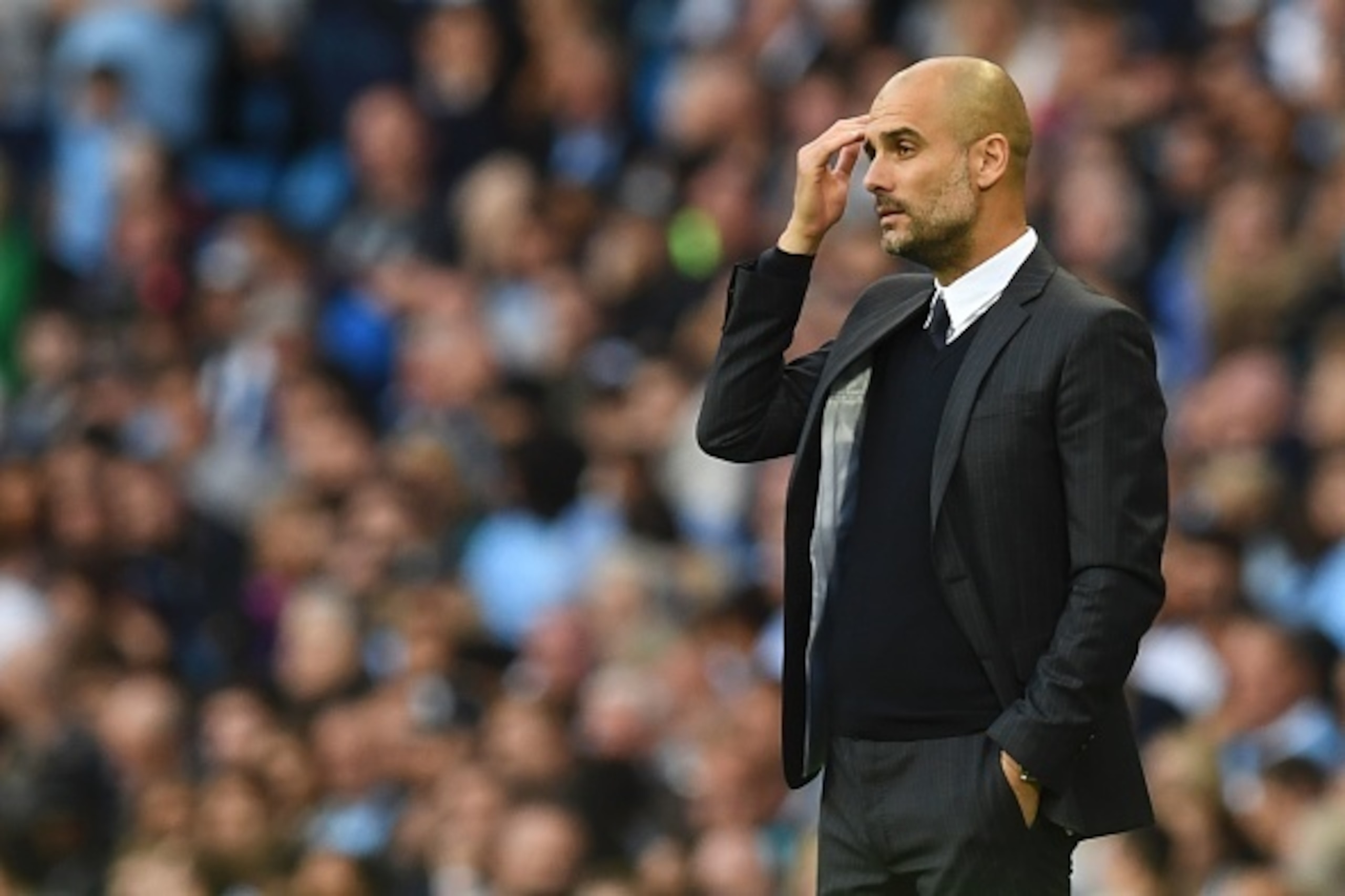 Manchester City's Spanish manager Pep Guardiola gestures from the touchline during the English Premier League football match between Manchester City and Sunderland at the Etihad Stadium in Manchester, north west England, on August 13, 2016. / AFP / PAUL E Manchester City's Spanish manager Pep Guardiola gestures from the touchline during the English Premier League football match between Manchester City and Sunderland at the Etihad Stadium in Manchester, north west England, on August 13, 2016. / AFP / PAUL E