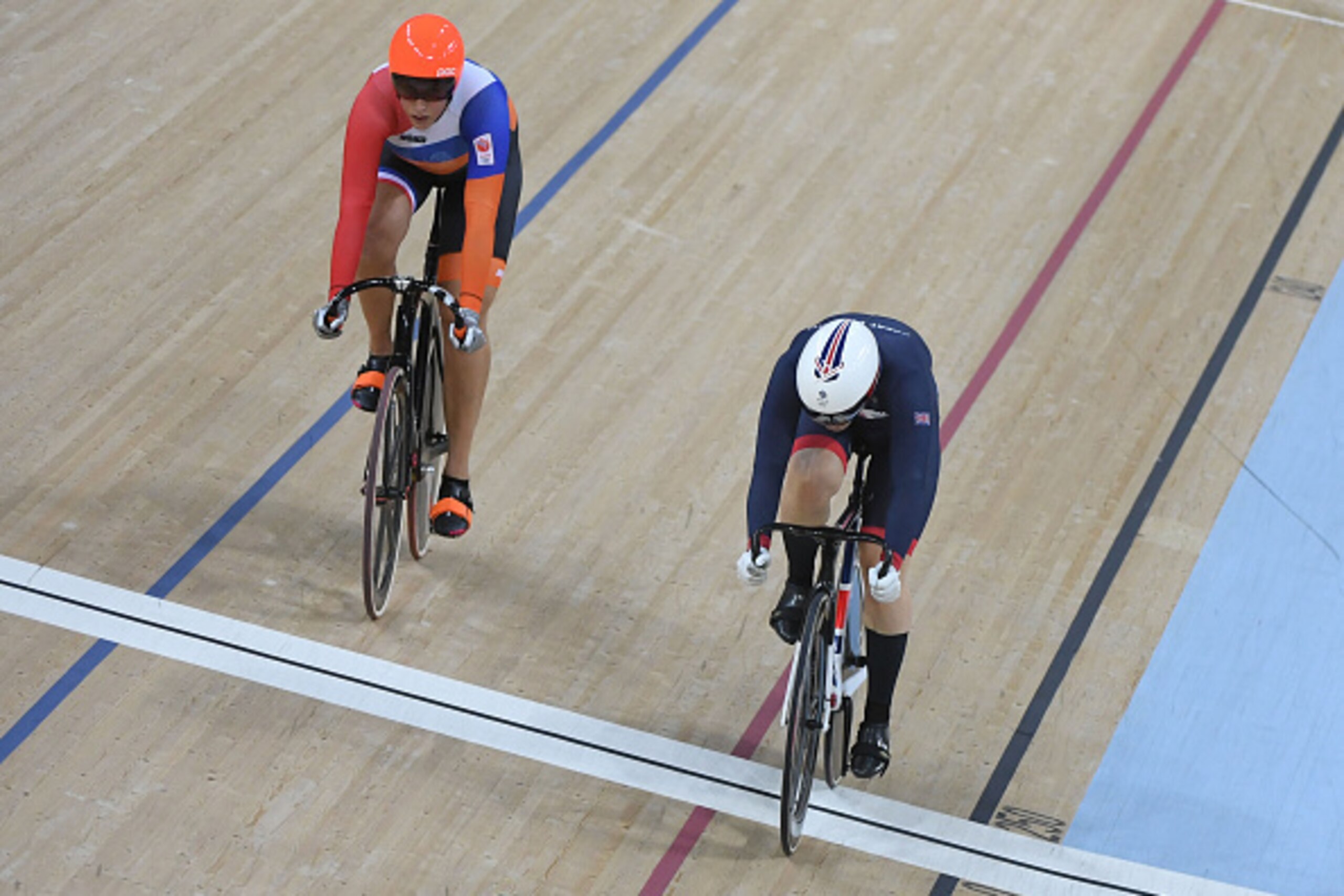 Britain's Katy Marchant (R) competes against the Netherlands' Elis Ligtlee in the Women's sprint finals track cycling event at the Velodrome during the Rio 2016 Olympic Games in Rio de Janeiro on August 16, 2016. / AFP / Greg BAKER        (Photo credit sh