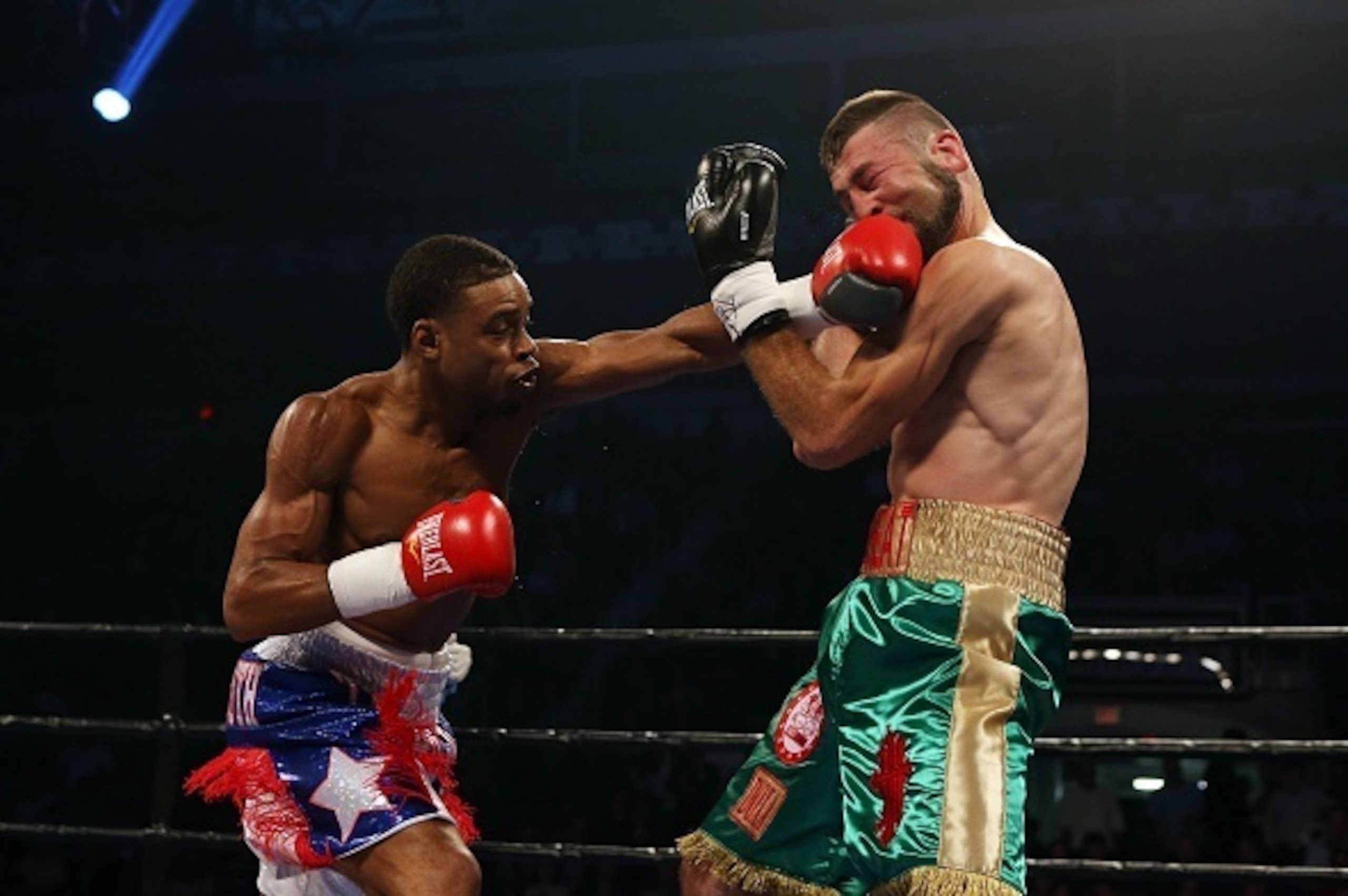 TORONTO, ON - SEPTEMBER 11:  Errol Spence Jr. lands a right against Chris van Heerden during their Premier Boxing Champions bout at the Ricoh Coliseum on September 11, 2015 in Toronto, Ontario, Canada.  (Photo by Vaughn Ridley/Getty Images)