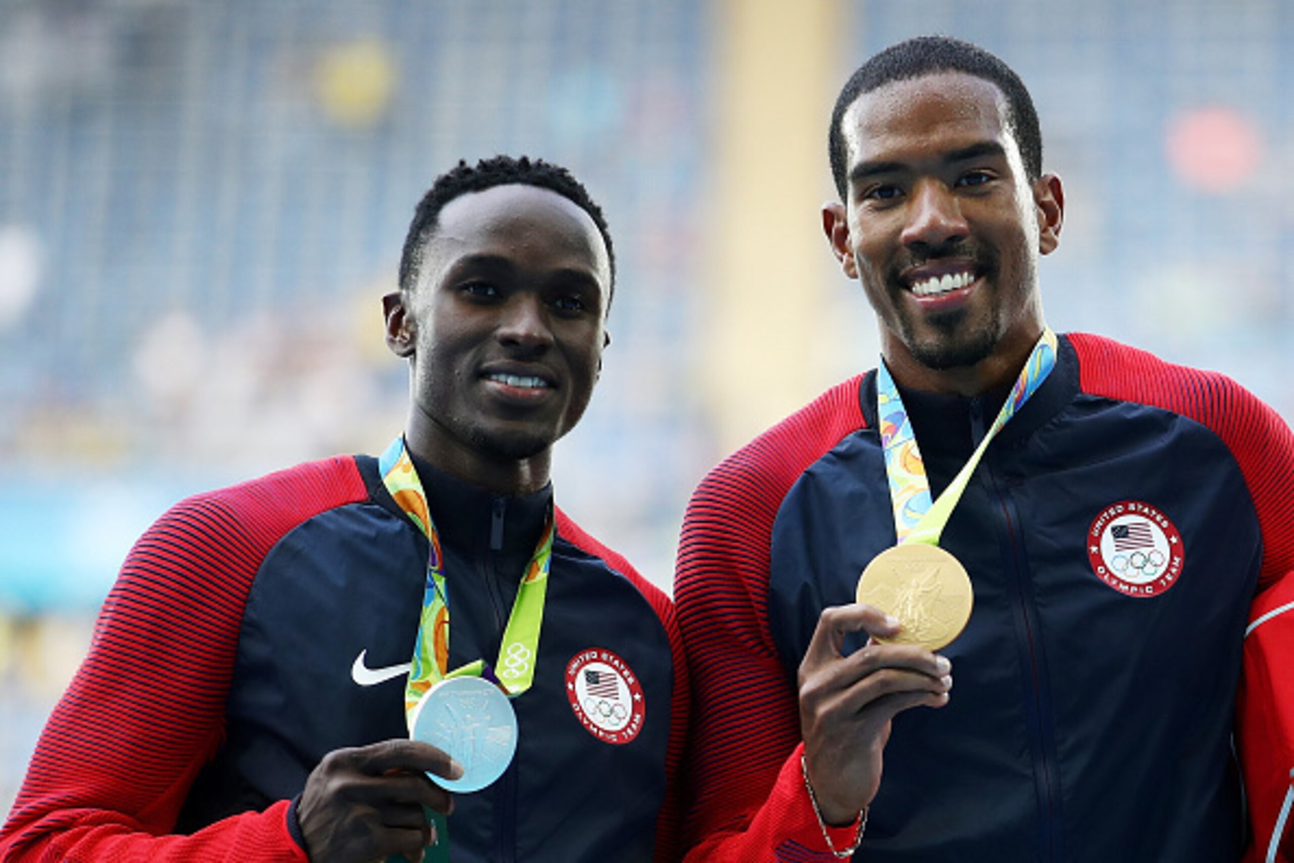 RIO DE JANEIRO, BRAZIL - AUGUST 16:  Silver medalist Will Claye of the United States (L) and gold medalist Christian Taylor of the United States pose during the medal ceremony for the Men's Triple Jump Final on Day 11 of the Rio 2016 Olympic Games at the 