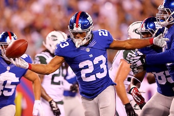 EAST RUTHERFORD, NJ - AUGUST 29:  Rashad Jennings #23 of the New York Giants celebrates his touchdown in the second quarter against the New York Jets during preseason action at MetLife Stadium on August 29, 2015 in East Rutherford, New Jersey.  (Photo by 