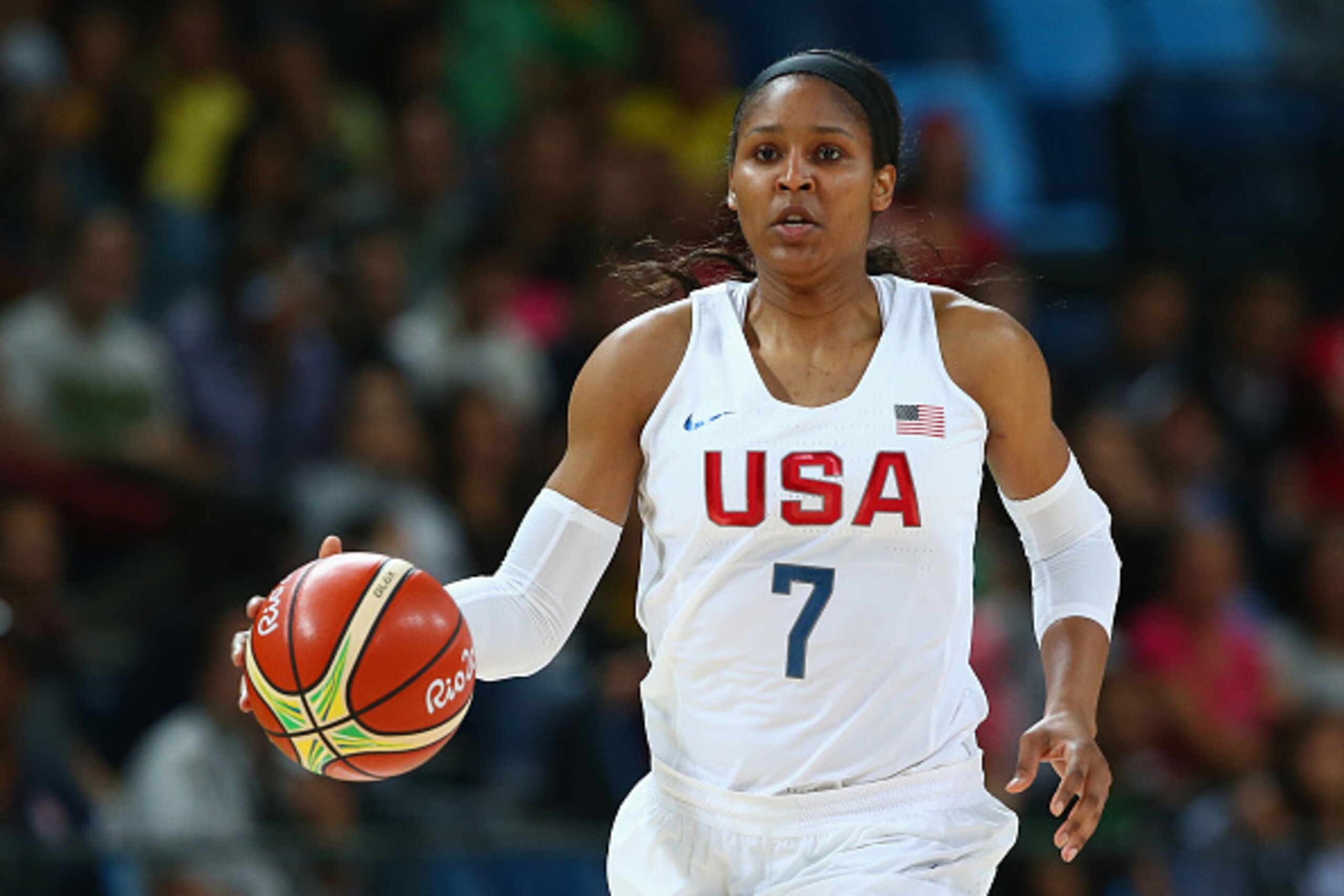 RIO DE JANEIRO, BRAZIL - AUGUST 16: Maya Moore #7 of United States controls the ball during the Women's Quarterfinal match against Japan on Day 11 of the Rio 2016 Olympic Games at Carioca Arena 1 on August 16, 2016 in Rio de Janeiro, Brazil. (Photo by Al RIO DE JANEIRO, BRAZIL - AUGUST 16: Maya Moore #7 of United States controls the ball during the Women's Quarterfinal match against Japan on Day 11 of the Rio 2016 Olympic Games at Carioca Arena 1 on August 16, 2016 in Rio de Janeiro, Brazil. (Photo by Al