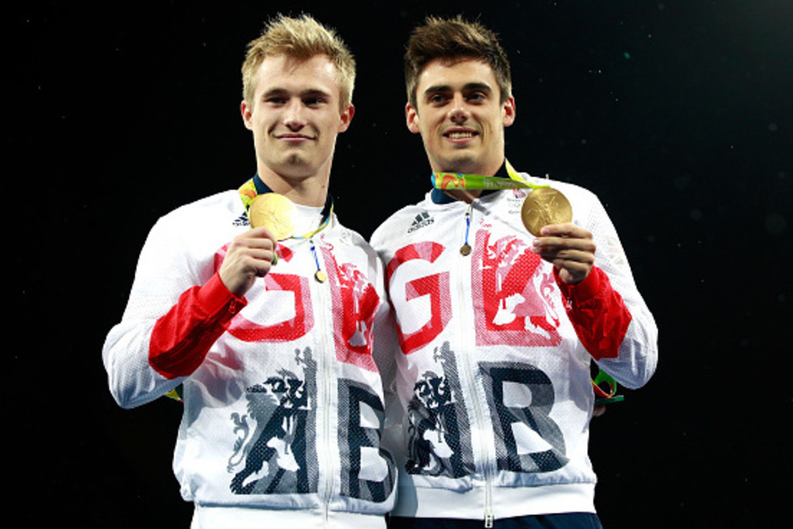 RIO DE JANEIRO, BRAZIL - AUGUST 10:  (L-R) Gold medalists Jack Laugher and Chris Mears of Great Britain pose during the medal ceremony for the Men's Diving Synchronised 3m Springboard Final on Day 5 of the Rio 2016 Olympic Games at Maria Lenk Aquatics Cen