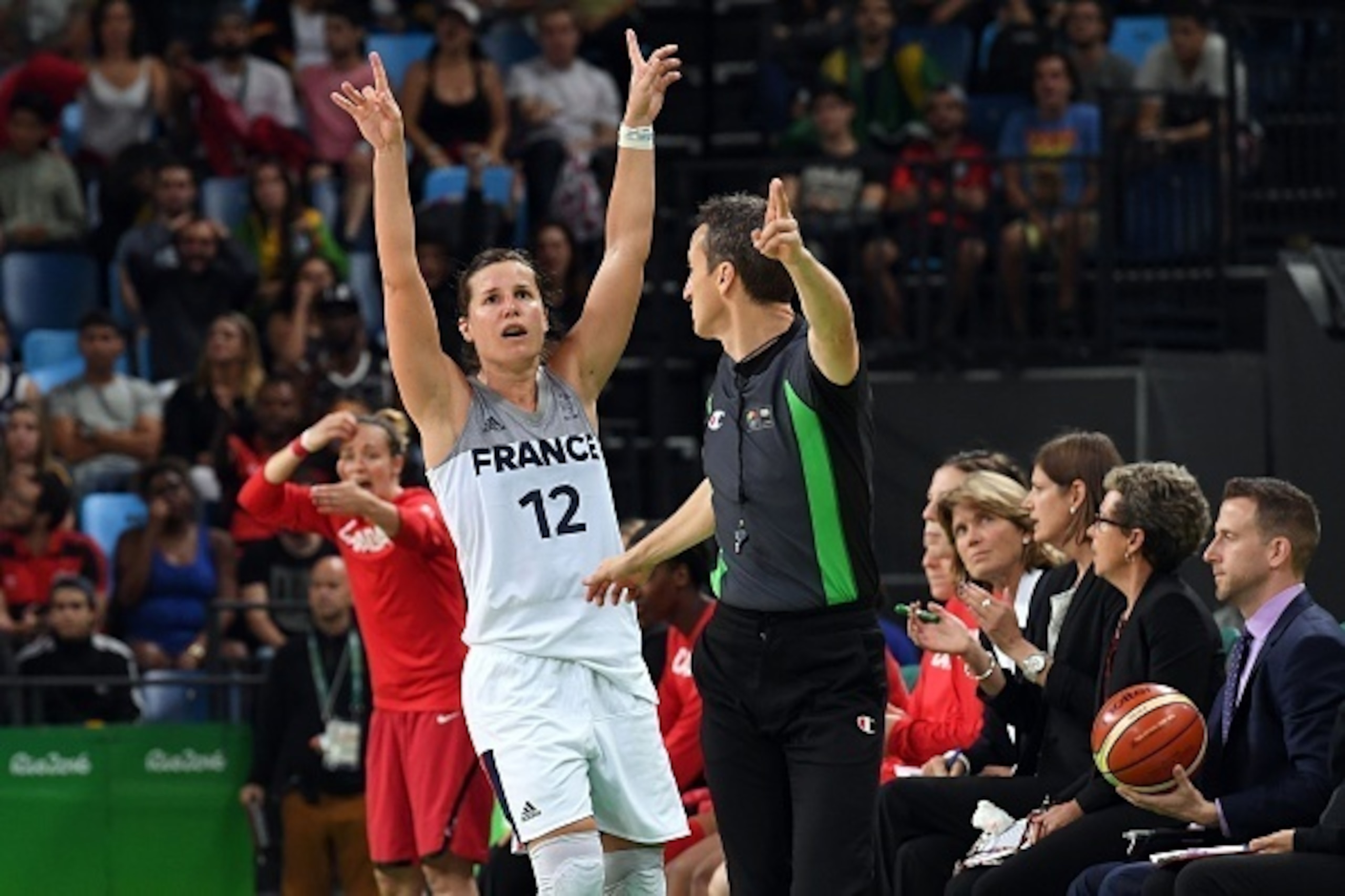 France's guard Gaelle Skrela celebrates a point during a Women's quarterfinal basketball match between France and Canada at the Carioca Arena 1 in Rio de Janeiro on August 16, 2016 during the Rio 2016 Olympic Games. / AFP / Mark RALSTON (Photo cre France's guard Gaelle Skrela celebrates a point during a Women's quarterfinal basketball match between France and Canada at the Carioca Arena 1 in Rio de Janeiro on August 16, 2016 during the Rio 2016 Olympic Games. / AFP / Mark RALSTON (Photo cre
