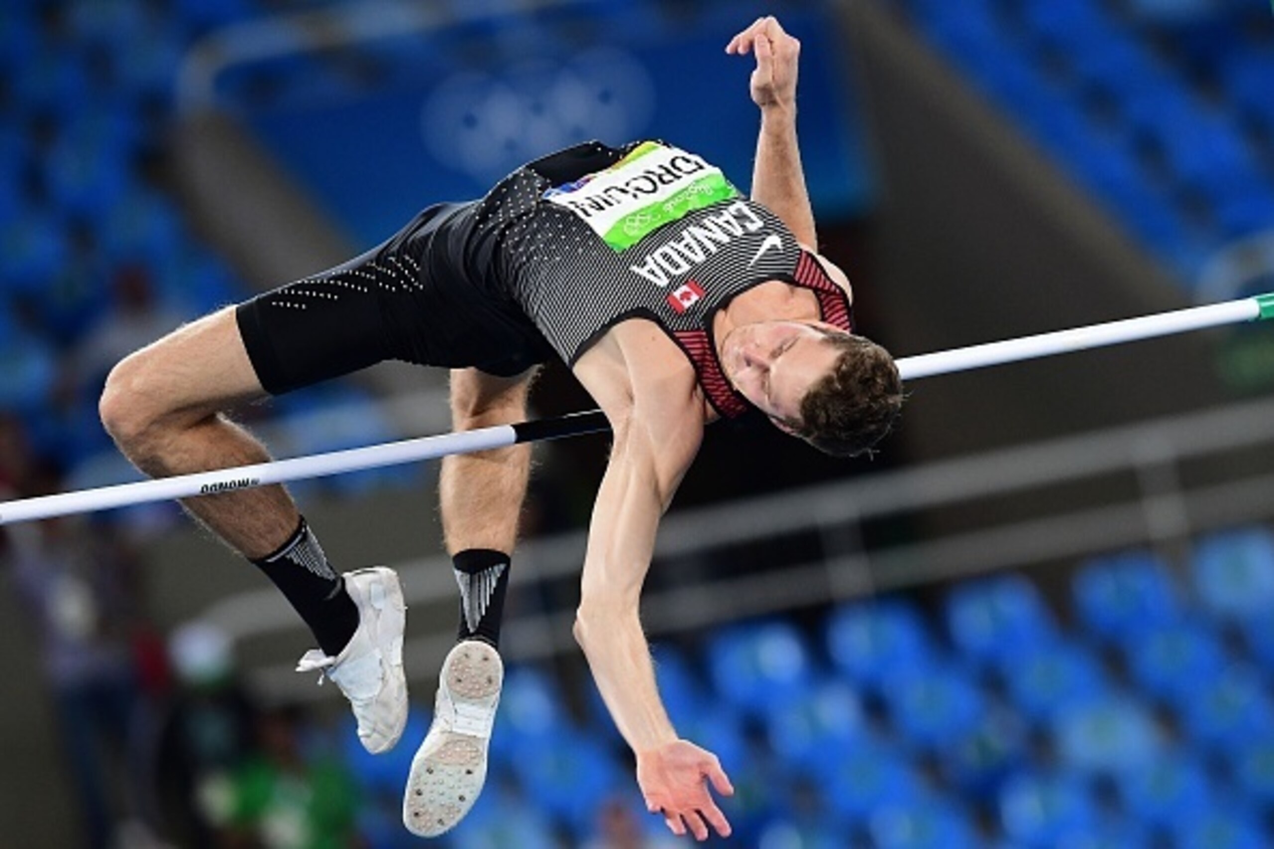 Canada's Derek Drouin competes in the Men's High Jump Final during the athletics event at the Rio 2016 Olympic Games at the Olympic Stadium in Rio de Janeiro on August 16, 2016.   / AFP / FRANCK FIFE        (Photo credit should read FRANCK FIFE/AFP/Getty 