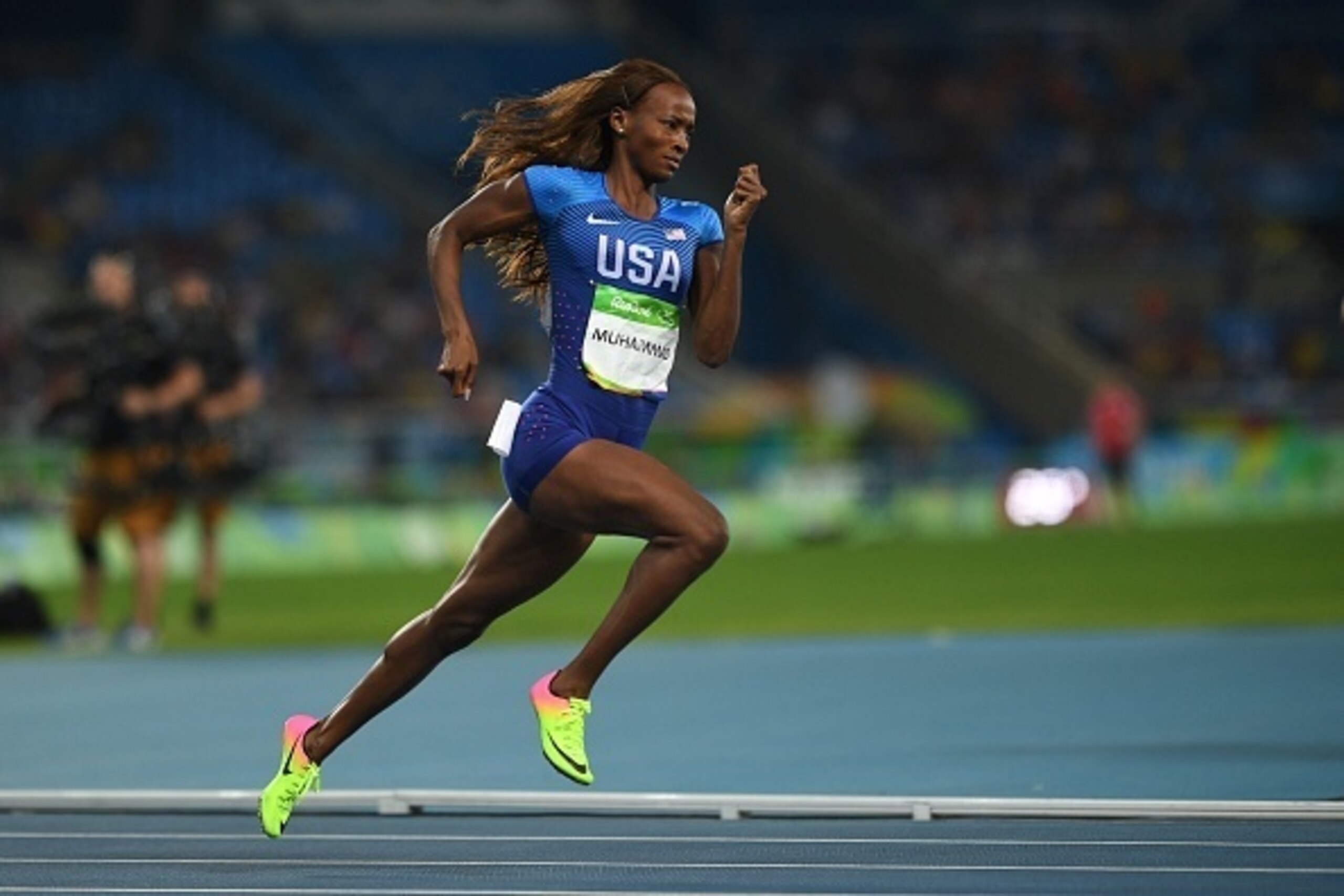 USA's Dalilah Muhammad competes in the Women's 400m Hurdles Semifinal during the athletics event at the Rio 2016 Olympic Games at the Olympic Stadium in Rio de Janeiro on August 16, 2016.   / AFP / Johannes EISELE        (Photo credit should read JOHANNES
