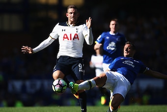 LIVERPOOL, ENGLAND - AUGUST 13: Vincent Janssen of Tottenham Hotspur is tackled by Phil Jagielka of Everton during the Premier League match between Everton and Tottenham Hotspur at Goodison Park on August 13, 2016 in Liverpool, England.  (Photo by Jan Kru