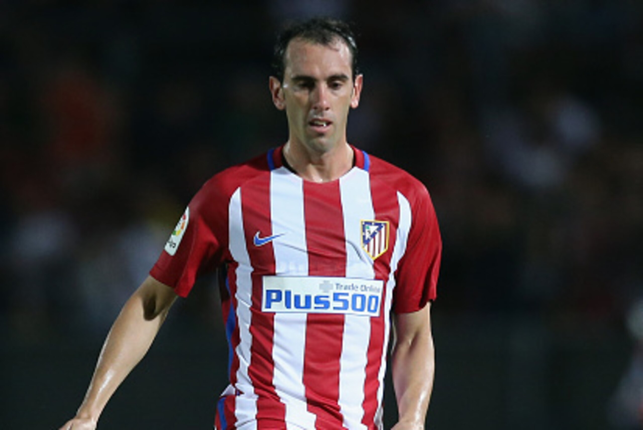 COSENZA, ITALY - AUGUST 06:  Diego Godin of Atletico de Madrid during pres-season friendly match between FC Crotone and Club Atletico de Madrid at Stadio Comunale Gigi Marulla on August 6, 2016 in Cosenza, Italy.  (Photo by Maurizio Lagana/Getty Images)
