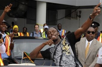 Bolt returns to Kingston from the 2008 Olympics.