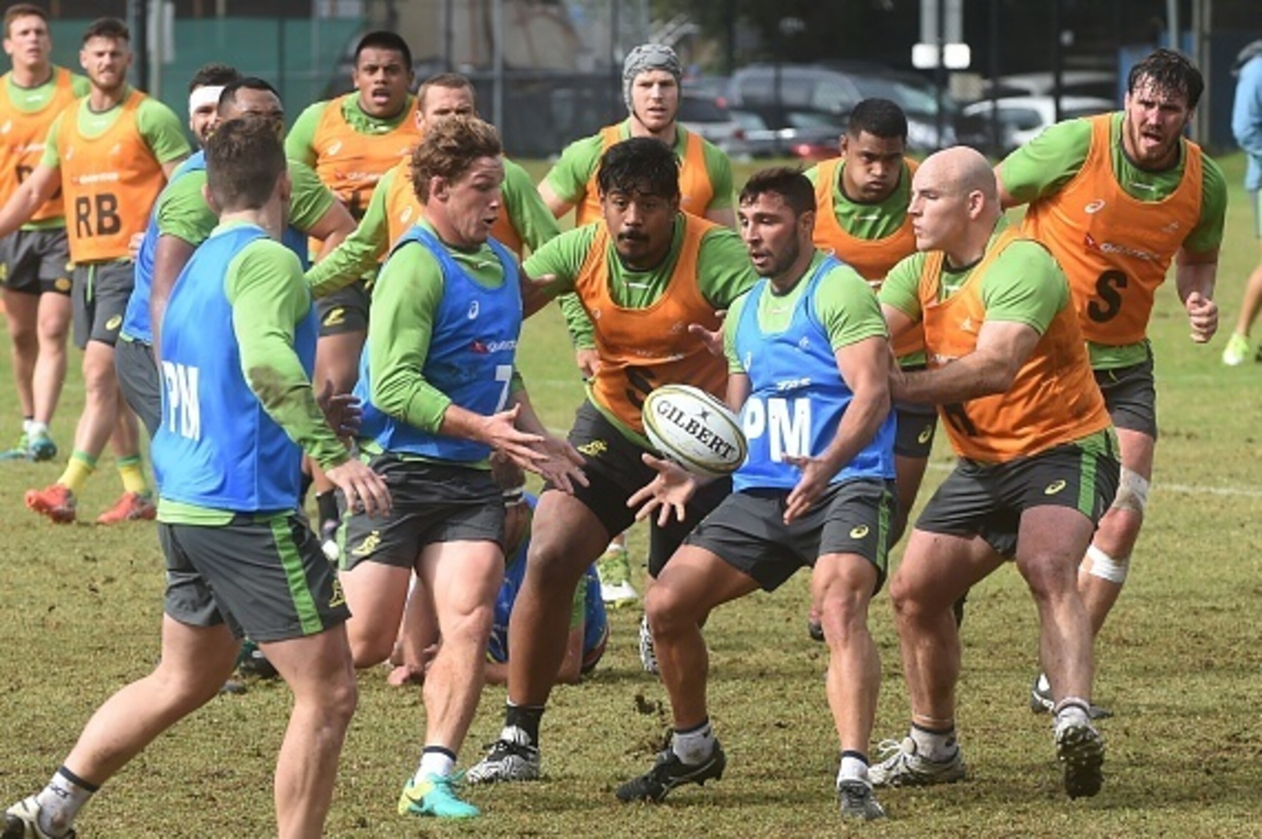 Australian rugby players play during a training session in Sydney on August 5, 2016.  
 Coach Michael Cheika named five foreign-based stars and four uncapped players in a 33-man Wallabies squad for the Rugby Championship and Bledisloe Cup campaigns starti