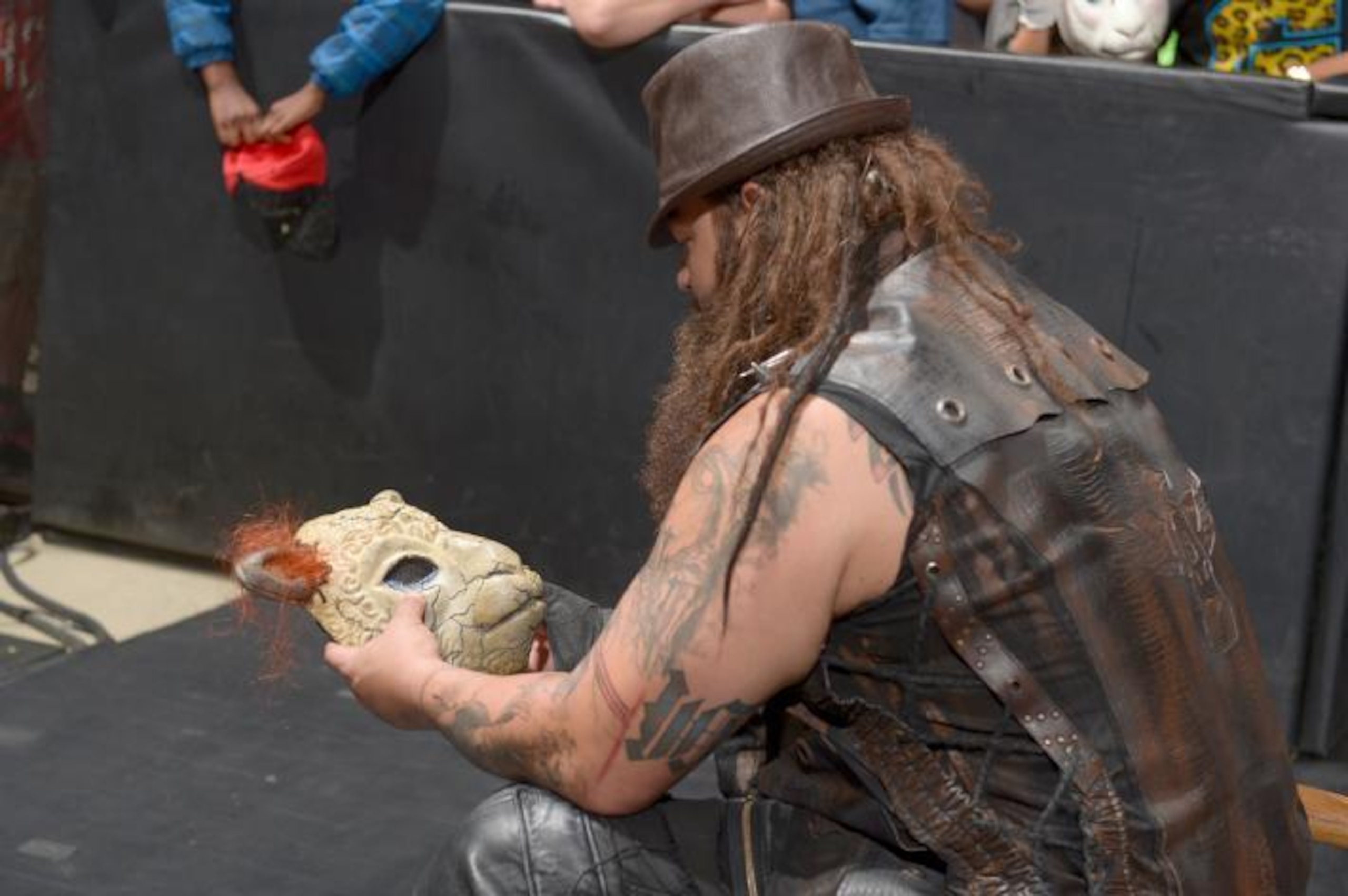 Bray Wyatt stares at Erick Rowan's sheep mask.