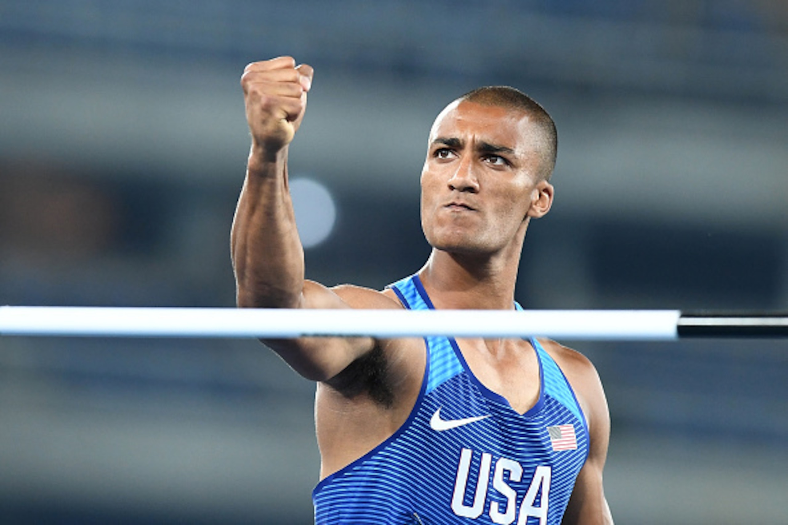 USA's Ashton Eaton celebrates after competing in the Men's Decathlon High Jump during the athletics event at the Rio 2016 Olympic Games at the Olympic Stadium in Rio de Janeiro on August 17, 2016.   / AFP / FRANCK FIFE        (Photo credit should read FRA