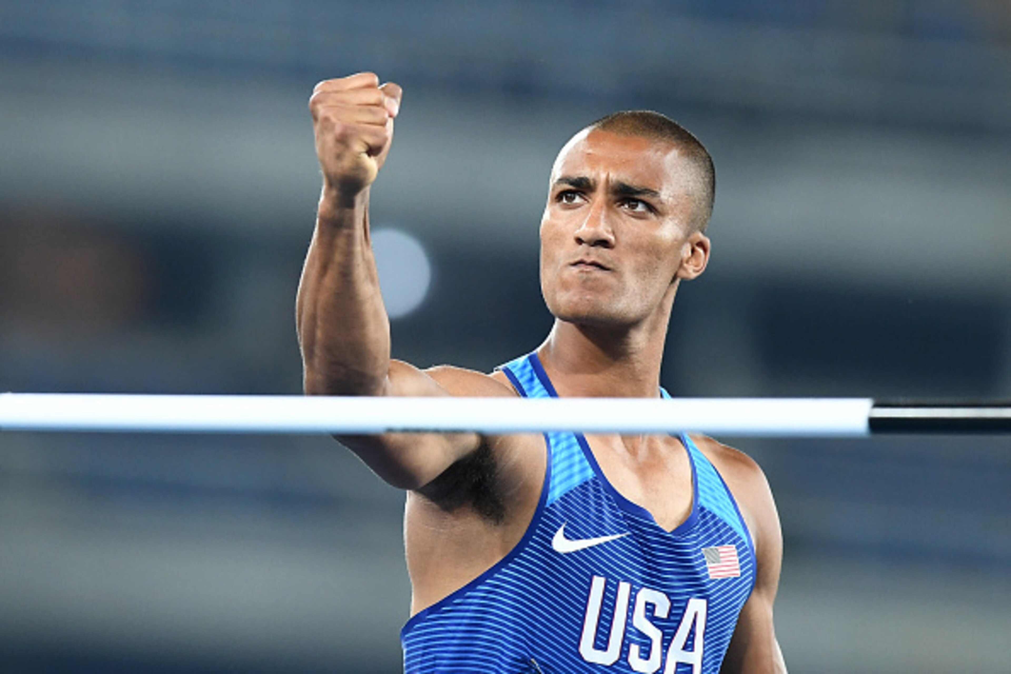 USA's Ashton Eaton celebrates after competing in the Men's Decathlon High Jump during the athletics event at the Rio 2016 Olympic Games at the Olympic Stadium in Rio de Janeiro on August 17, 2016.   / AFP / FRANCK FIFE        (Photo credit should read FRA