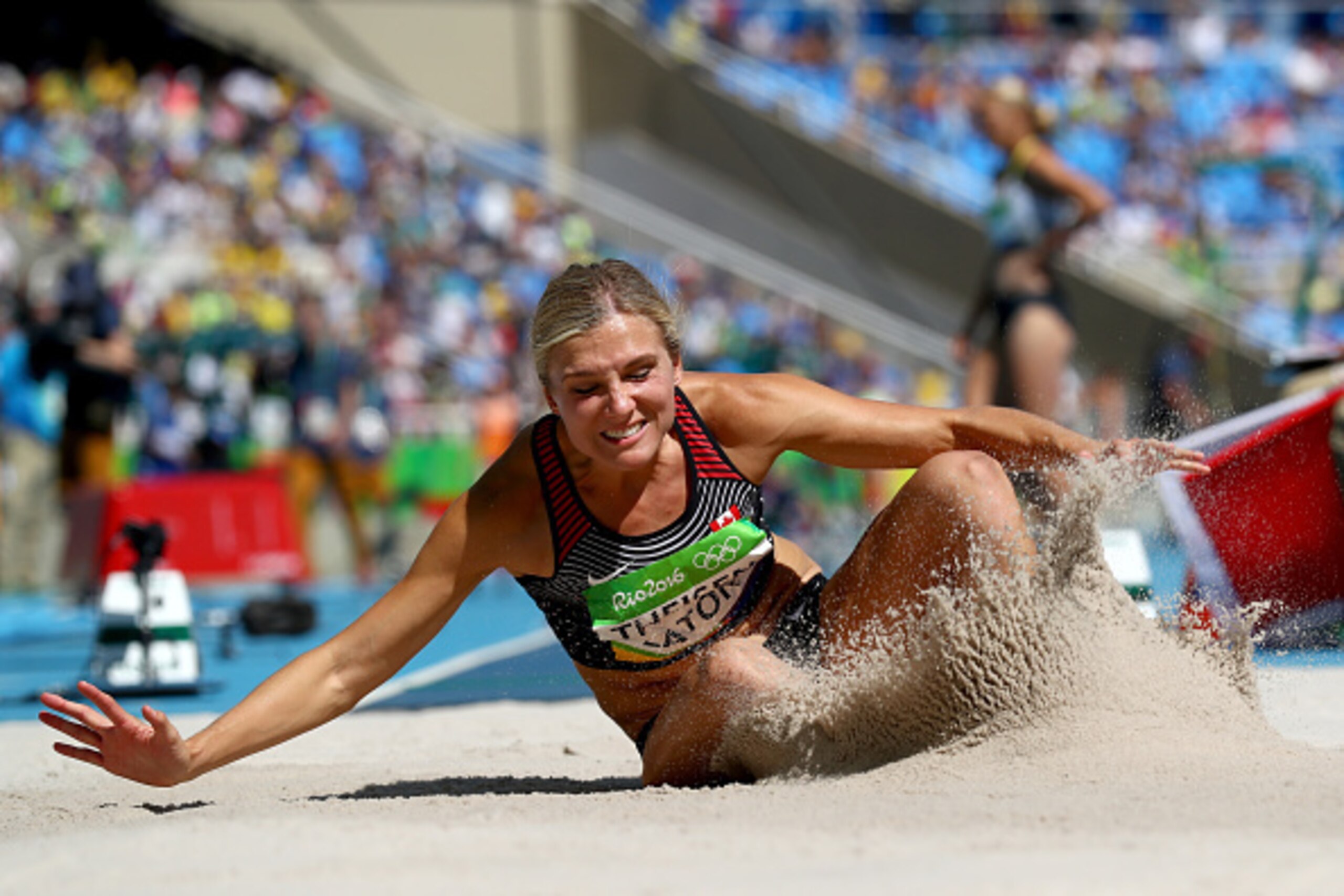 RIO DE JANEIRO, BRAZIL - AUGUST 13:  Brianne Theisen Eaton of Canada competes in the Women's Heptathlon Long Jump on Day 8 of the Rio 2016 Olympic Games at the Olympic Stadium on August 13, 2016 in Rio de Janeiro, Brazil.  (Photo by Alexander Hassenstein/