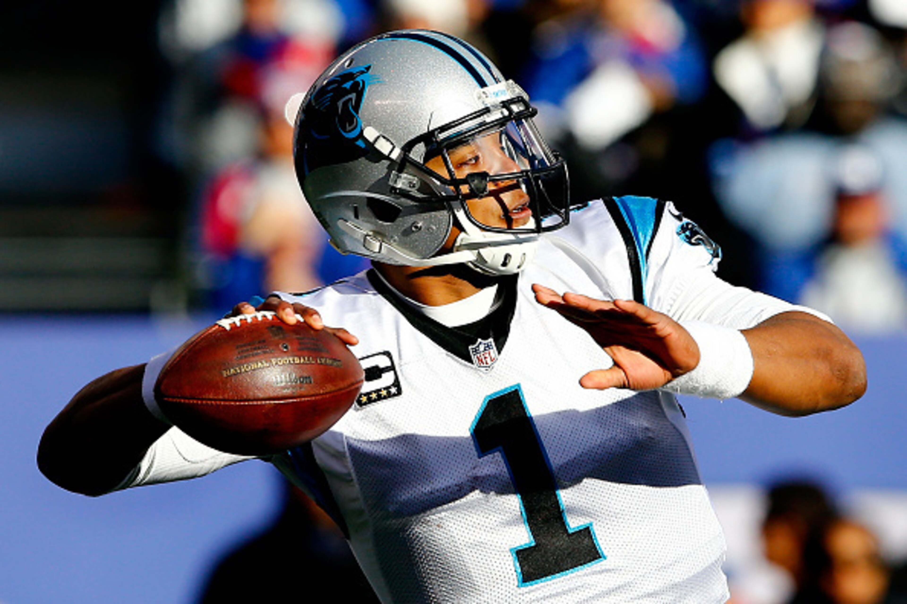 EAST RUTHERFORD, NJ - DECEMBER 20:  Cam Newton #1 of the Carolina Panthers in action against the New York Giants during their game at MetLife Stadium on December 20, 2015 in East Rutherford, New Jersey.  (Photo by Michael Reaves/Getty Images)