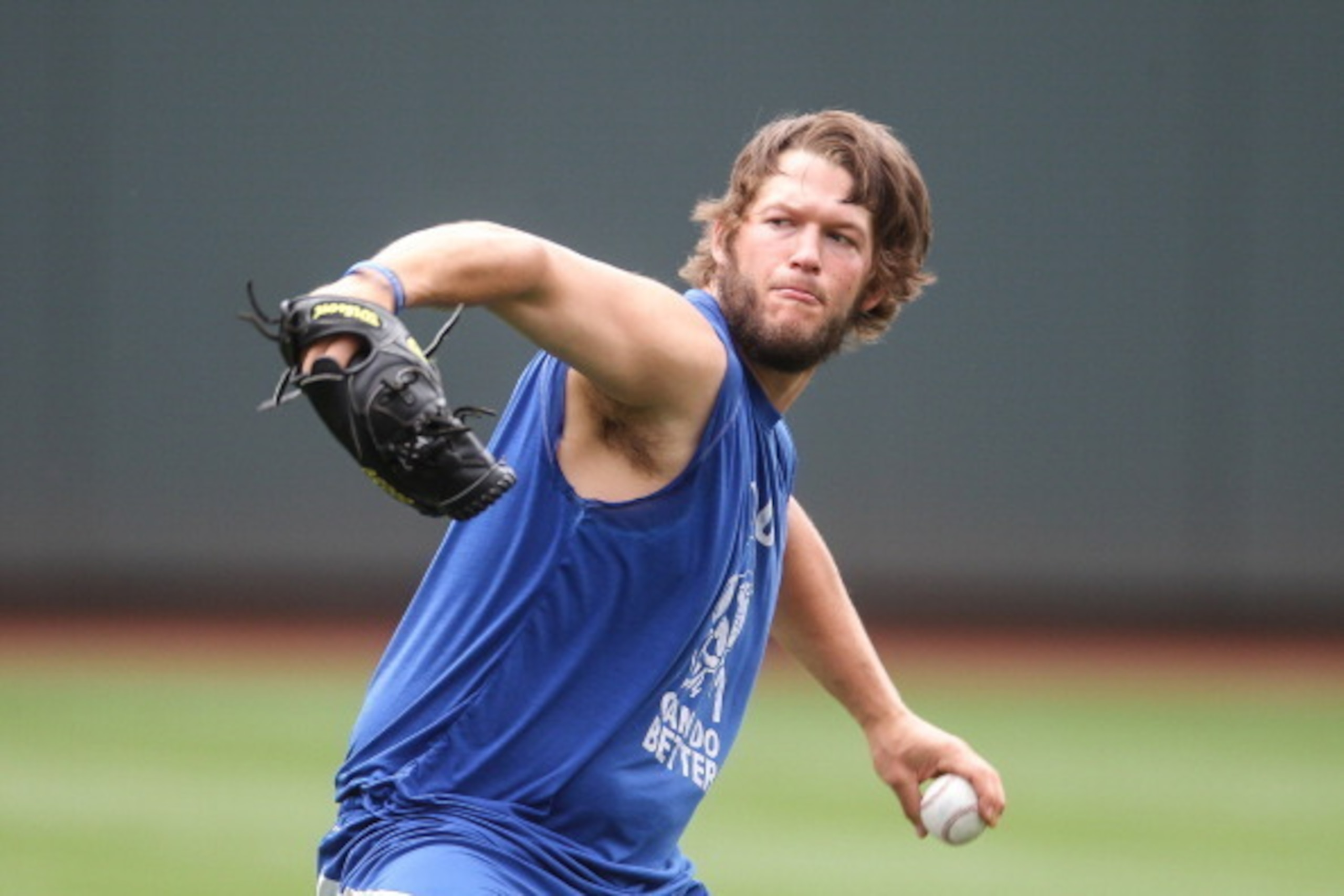CINCINNATI, OH - JUNE 12:  Pitcher Clayton Kershaw #22 of the Los Angeles Dodgers warms up before a MLB game against the Cincinnati Reds at Great American Ball Park on June 12, 2014 in Cincinnati, Ohio.  (Photo by John Capella/Sports Imagery/ Getty Images